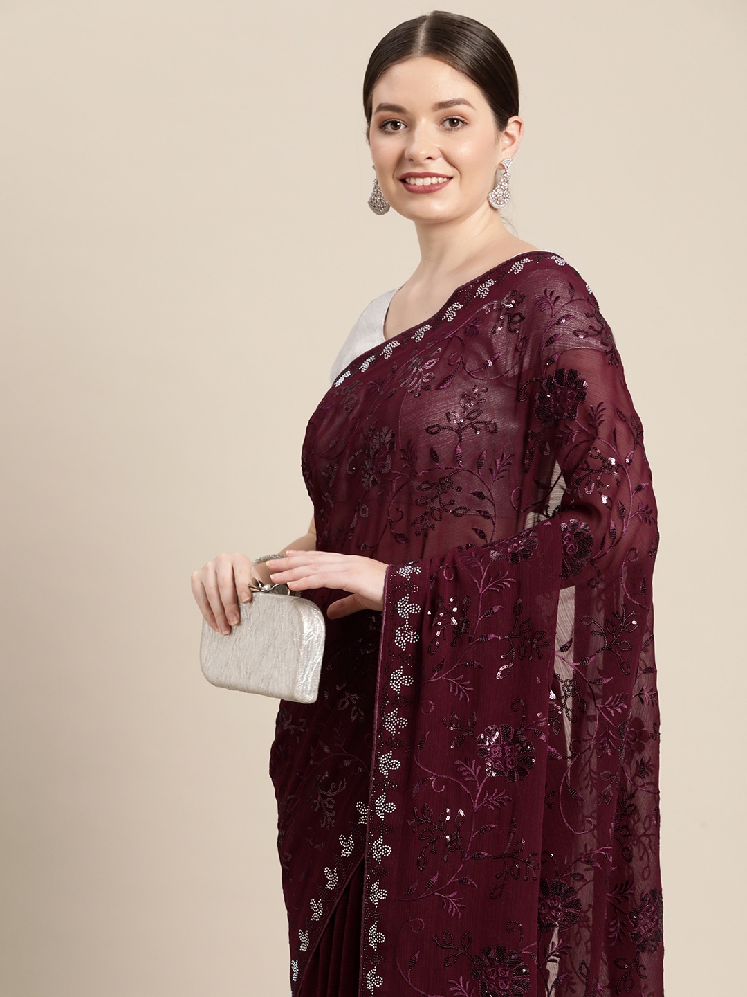 

Pothys Burgundy Ethnic Motifs Sequinned Pure Chiffon Saree