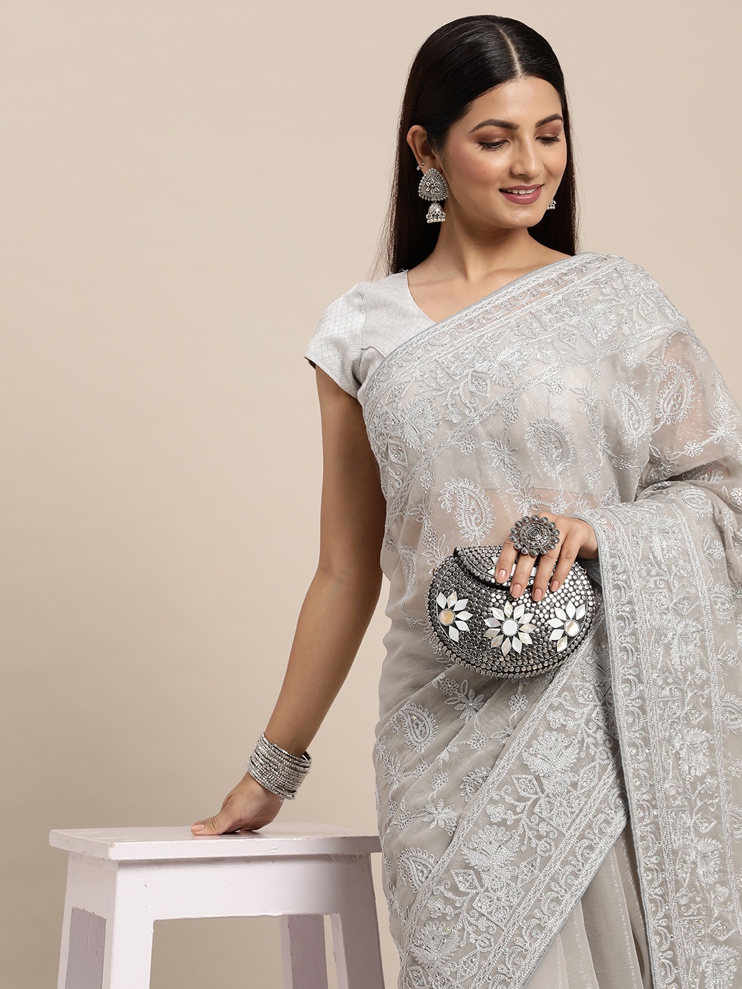 

Pothys Grey & White Ethnic Motifs Tissue Heavy Work Saree