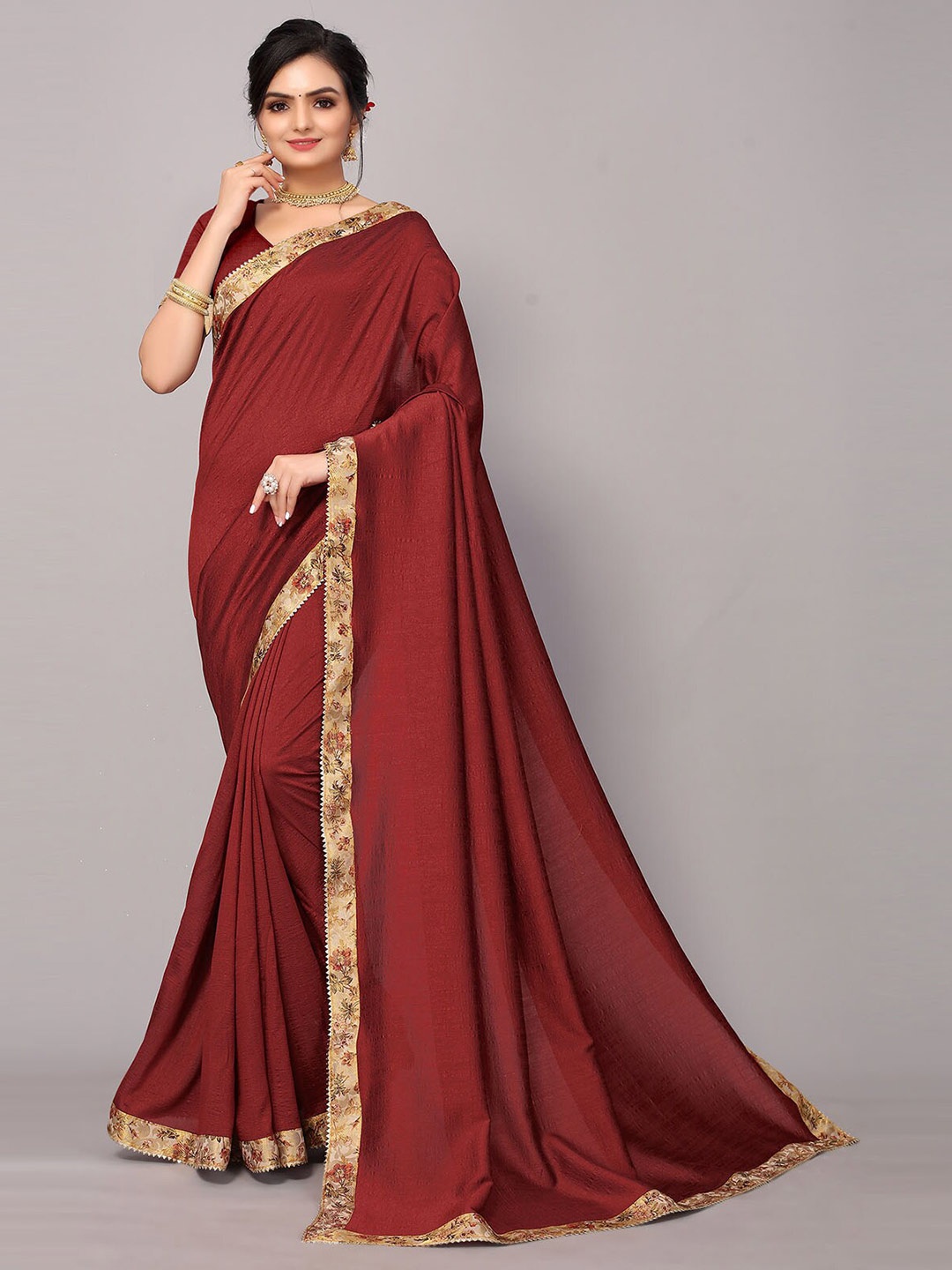 

ODETTE Maroon Silk Blend Printed Border Saree With Matching Blouse.