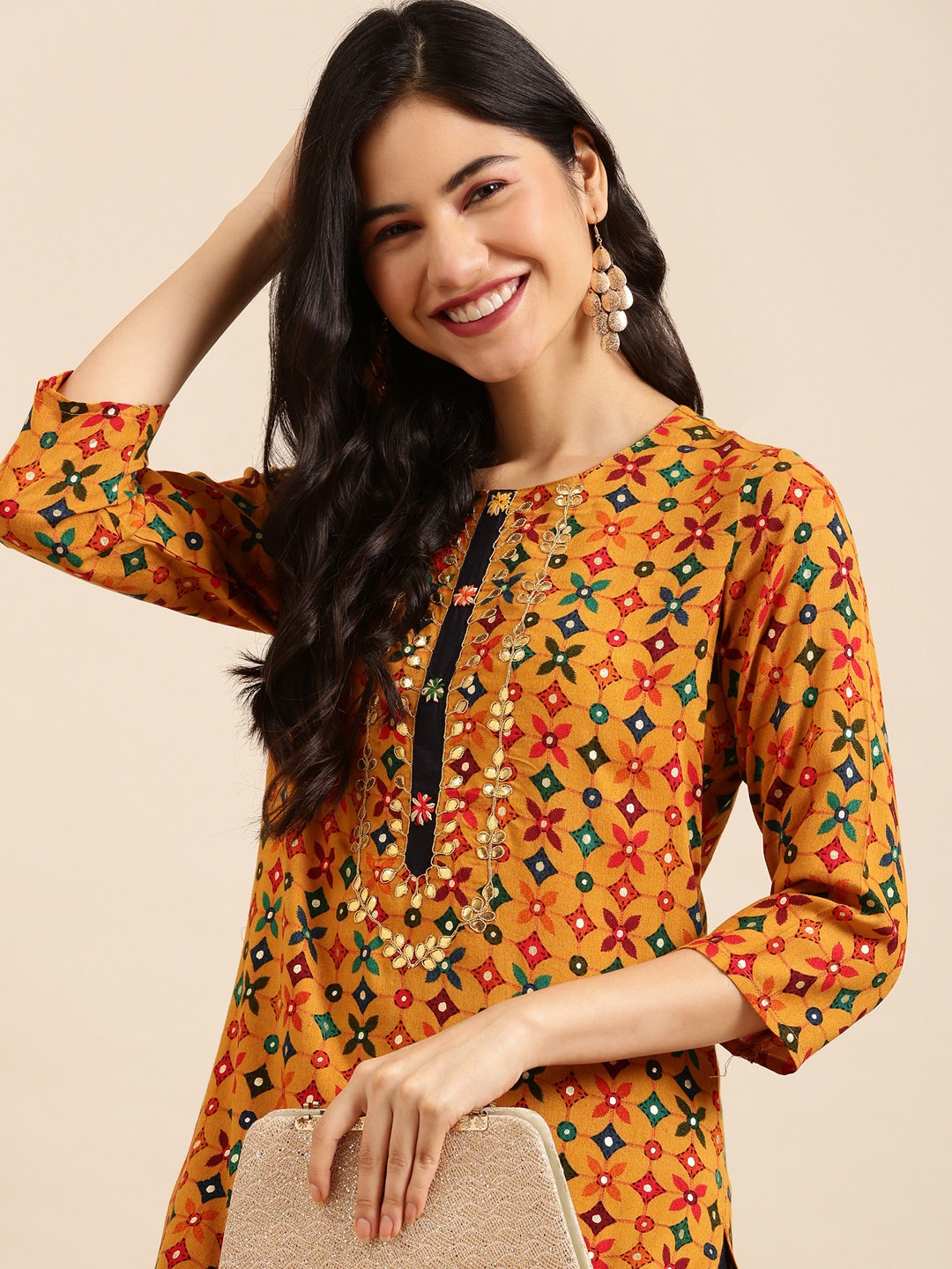 

SHOWOFF Women Mustard Ethnic Motifs Embroidered Kurta with Trouser Set