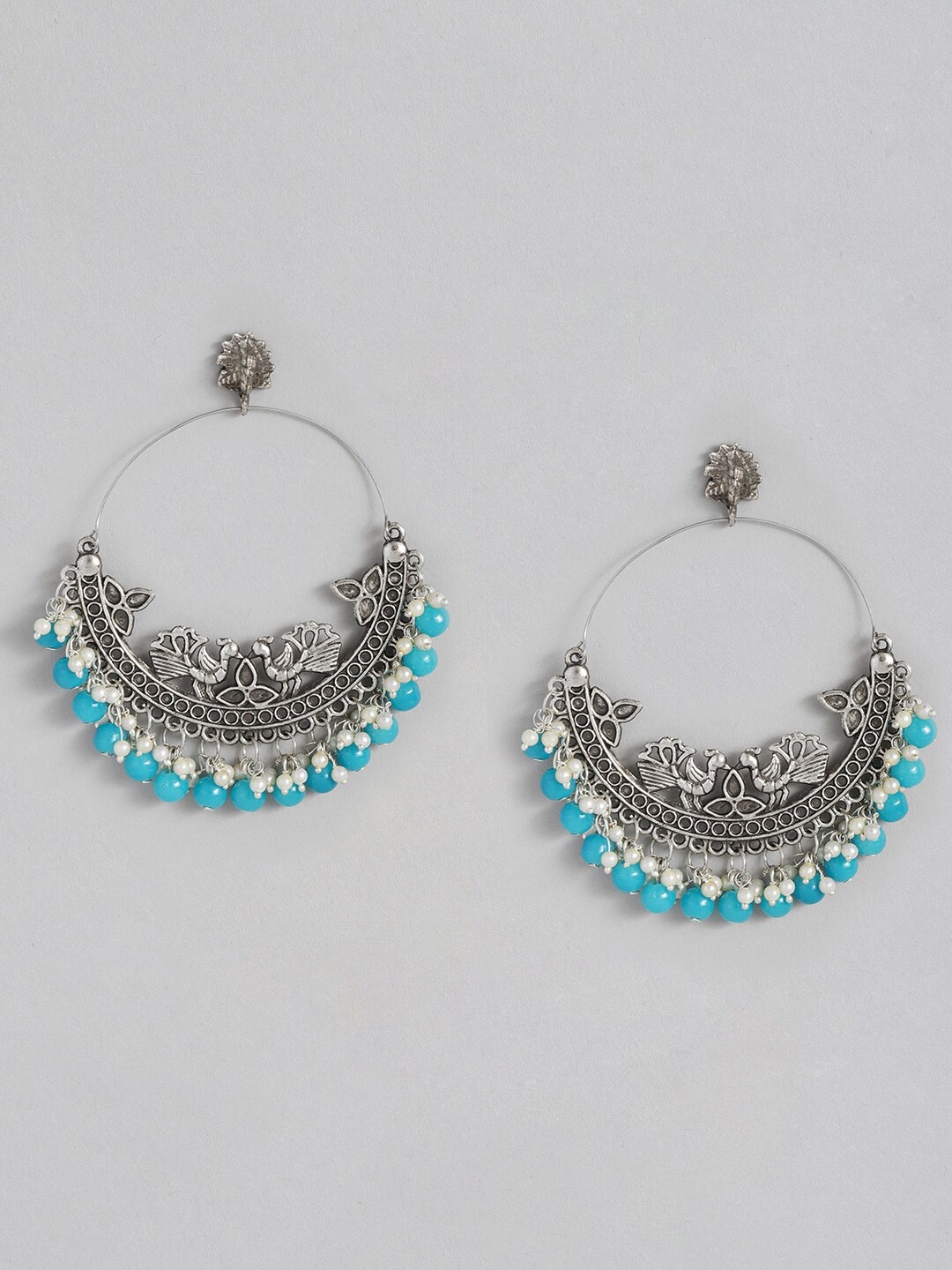 

Sangria Silver-Toned & Blue Crescent Shaped Chandbalis