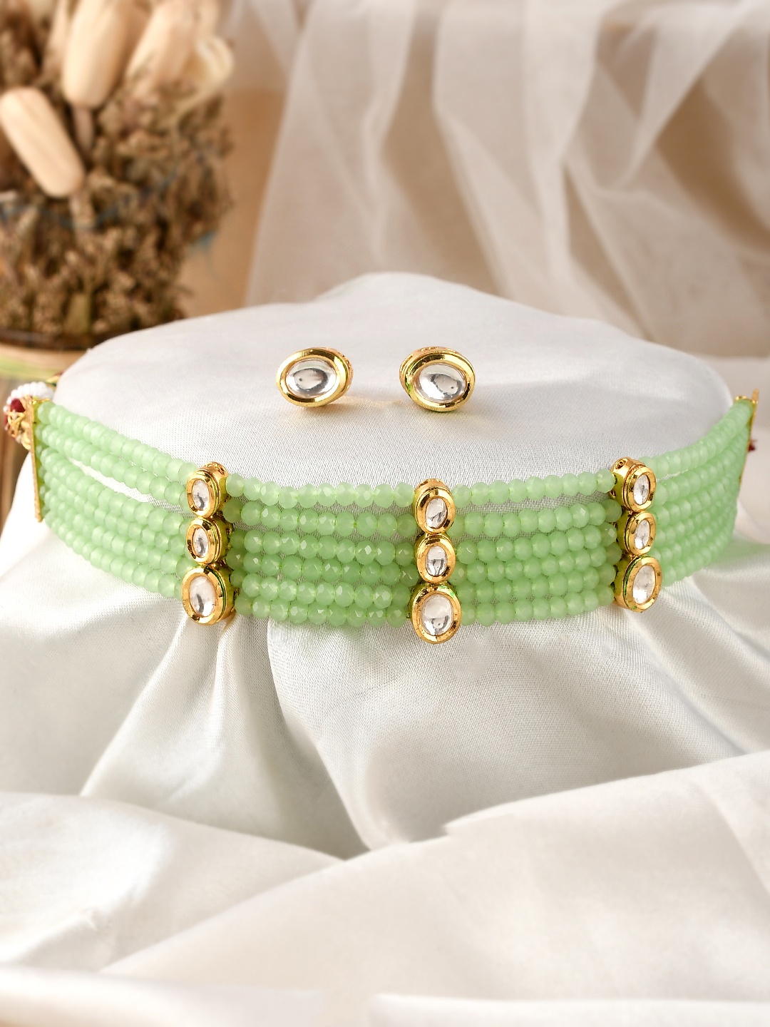 

AQUASTREET JEWELS Gold-Plated Green Kundan-Studded & Beaded Jewellery Set