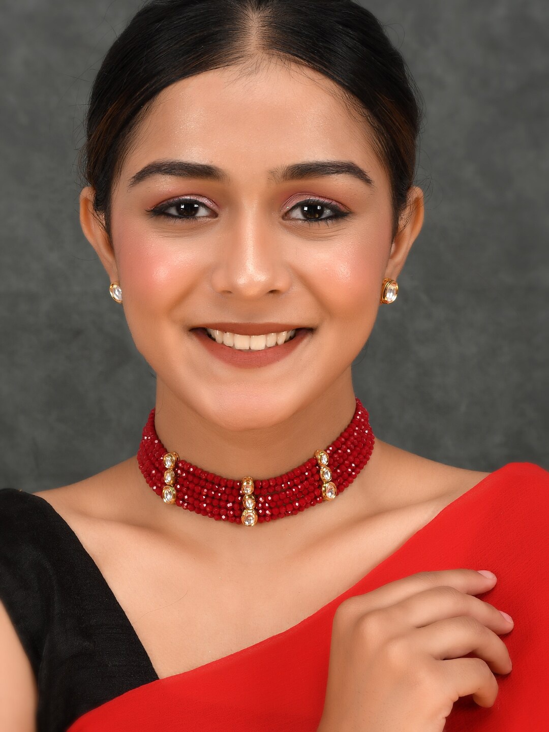 

AQUASTREET JEWELS Gold-Plated Red Kundan Studded Jewellery Set