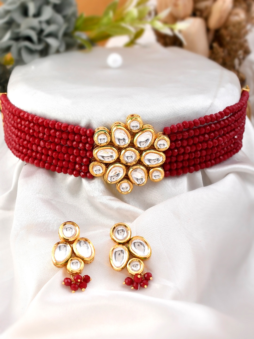 

AQUASTREET JEWELS Gold-Toned & Plated Red Kundan Studded Jewellery Set