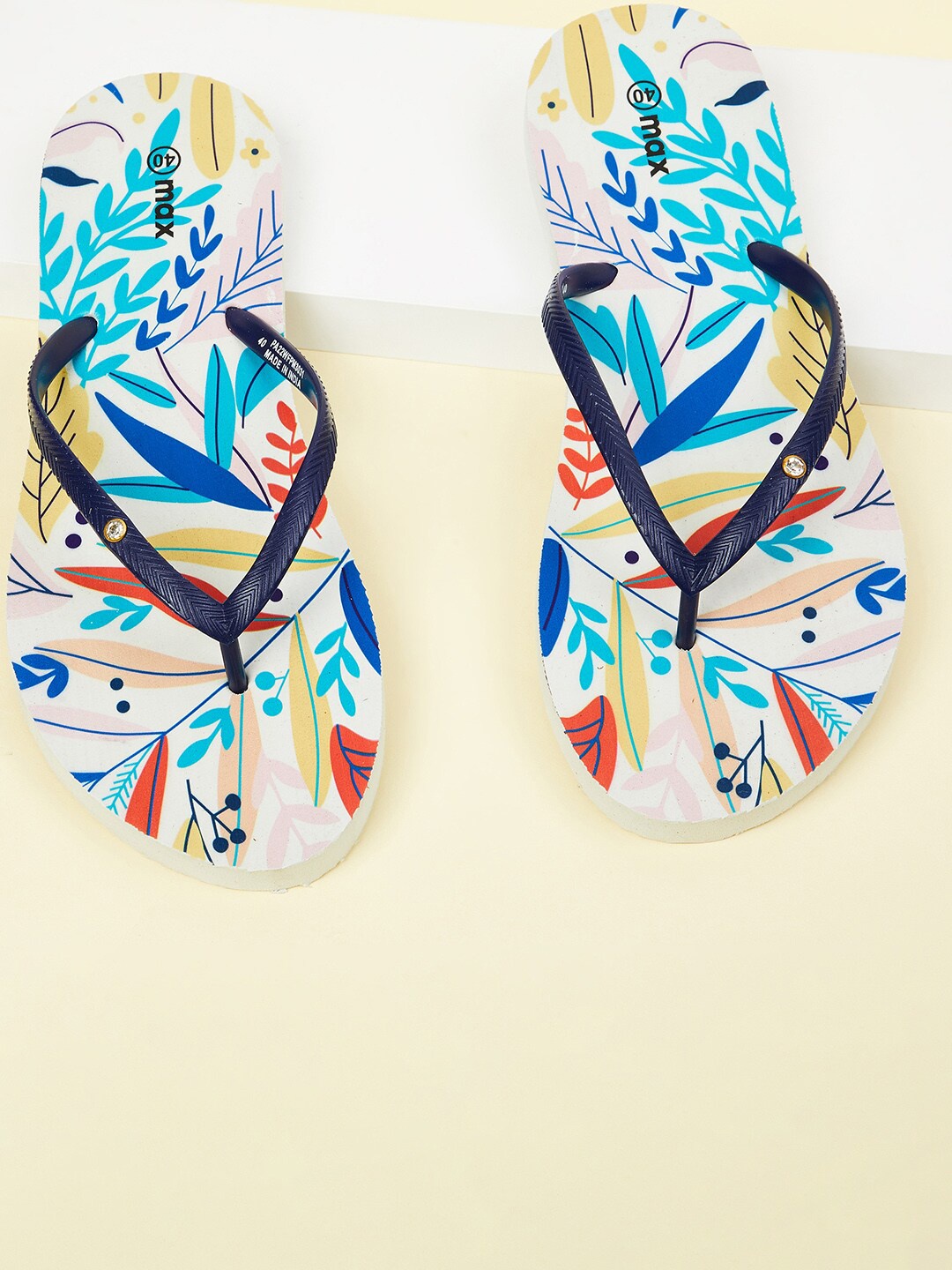 

max Women White & Blue Printed Thong Flip-Flops