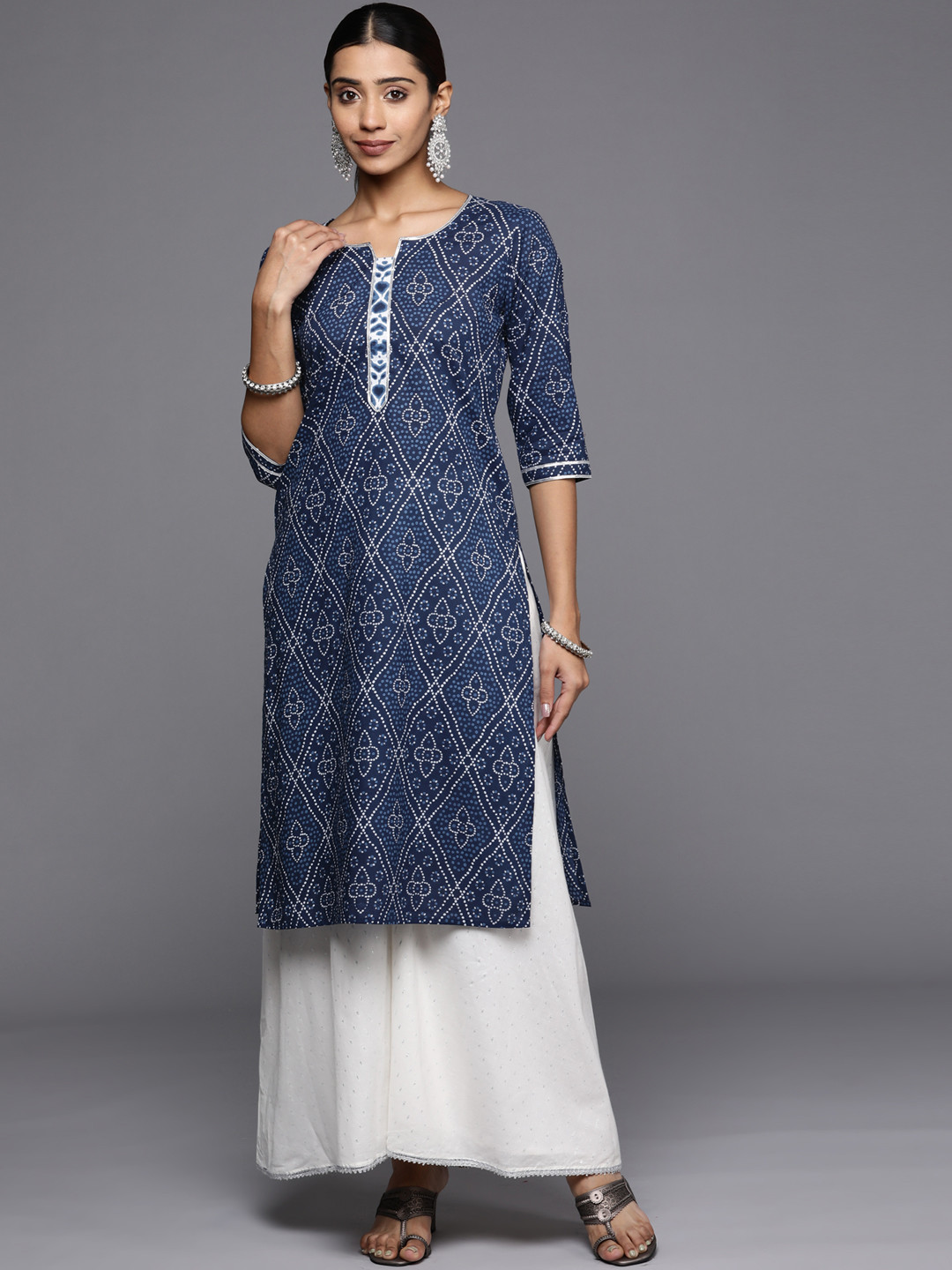 

Libas Women Blue & White Bandhani Printed Gotta Patti Cotton Kurta