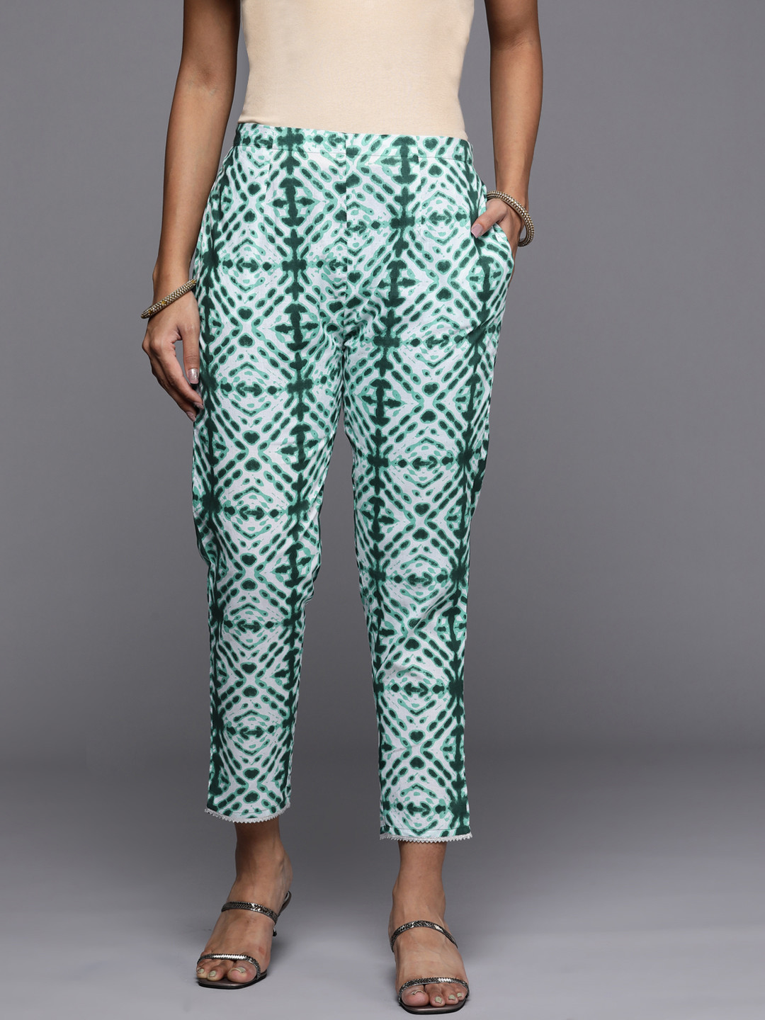 

Libas Women Green Tie and Dye Printed Relaxed Straight Leg Slim Fit Cotton Trousers