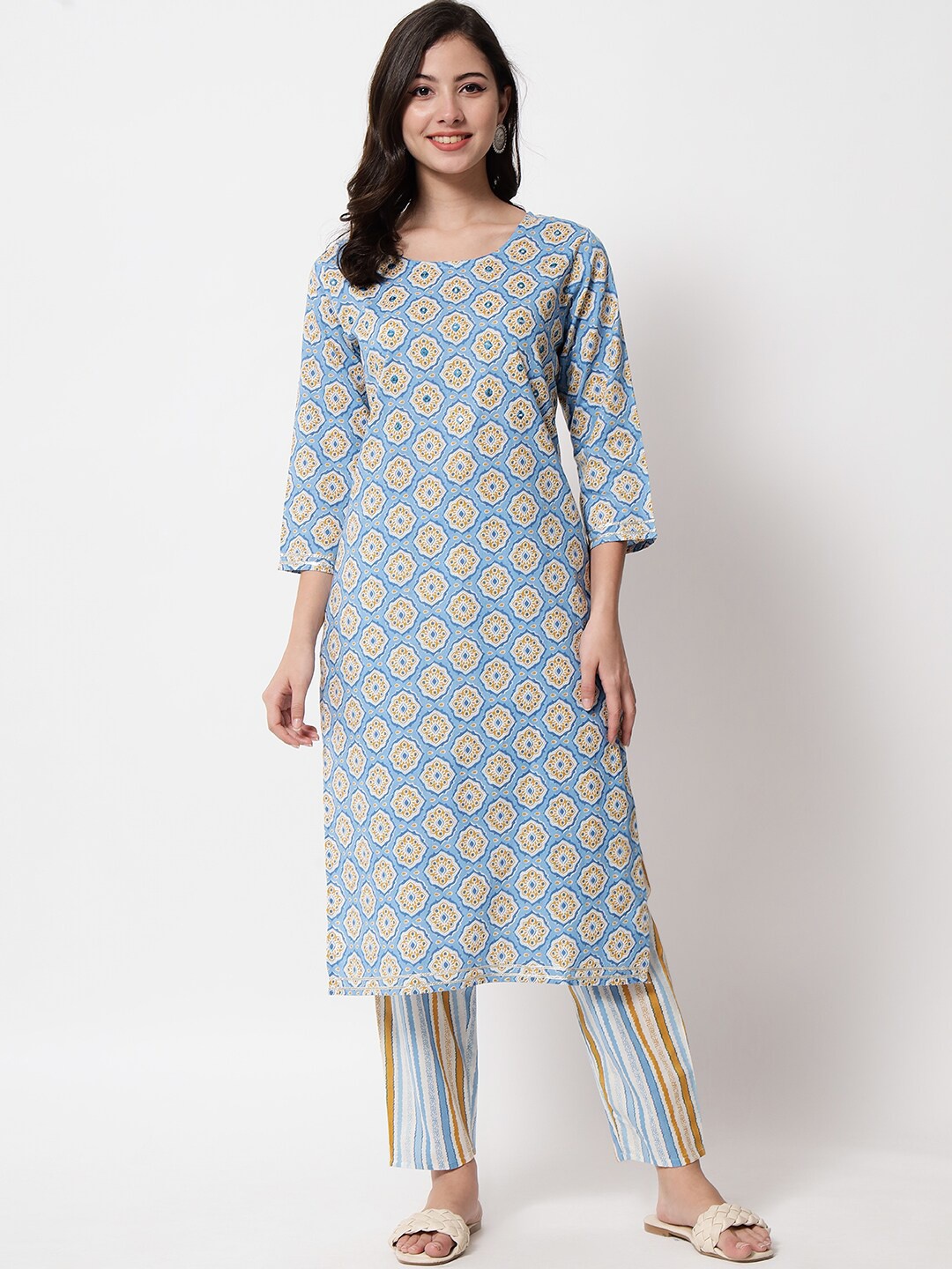 

IkDaiya Women Blue Floral Printed Regular Pure Cotton Kurti with Trousers