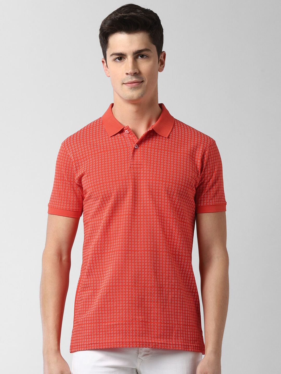 

Peter England Casuals Men Orange Printed Polo Collar T-shirt