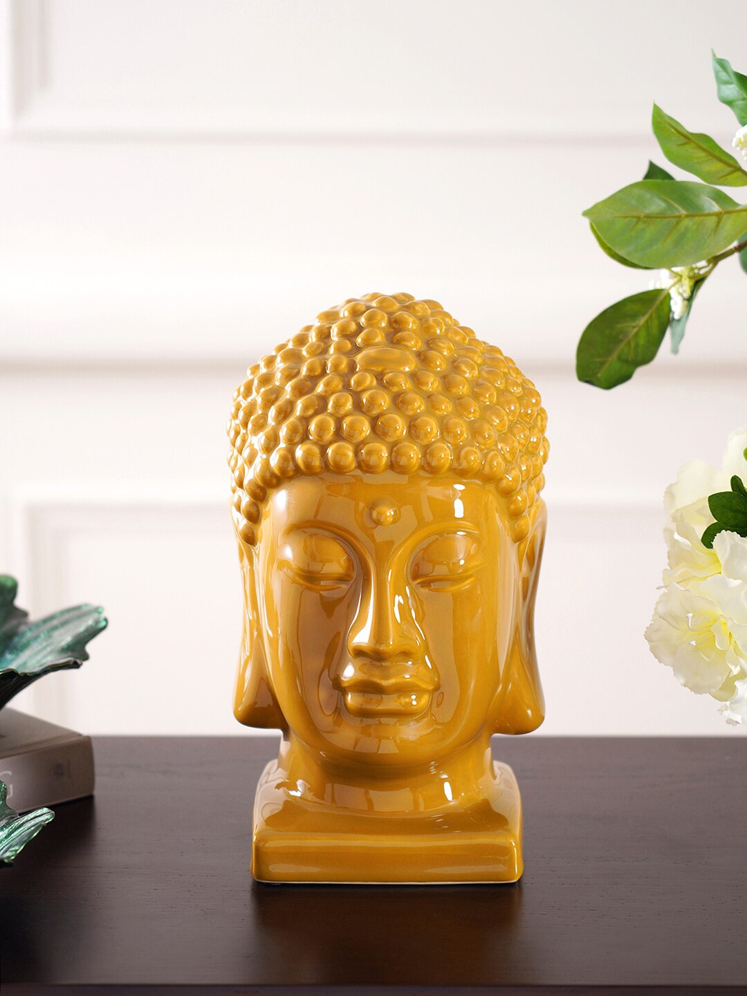 

Pure Home and Living Yellow Buddha Head on Stand Showpiece
