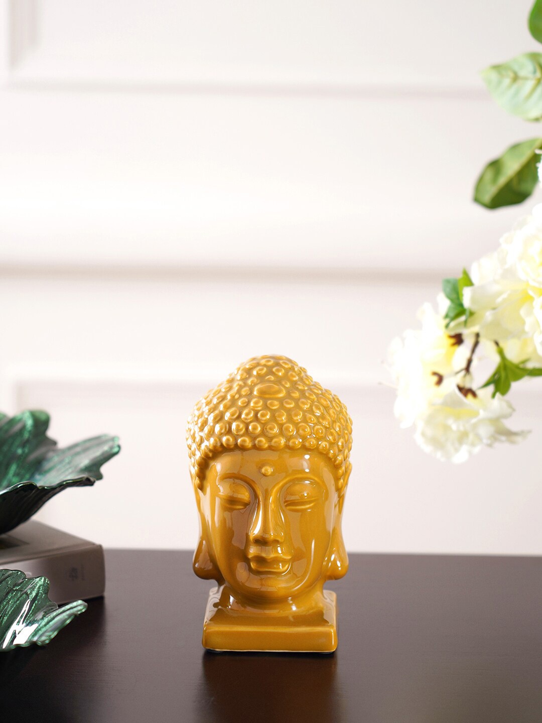 

Pure Home and Living Yellow Buddha Head On Stand Showpiece