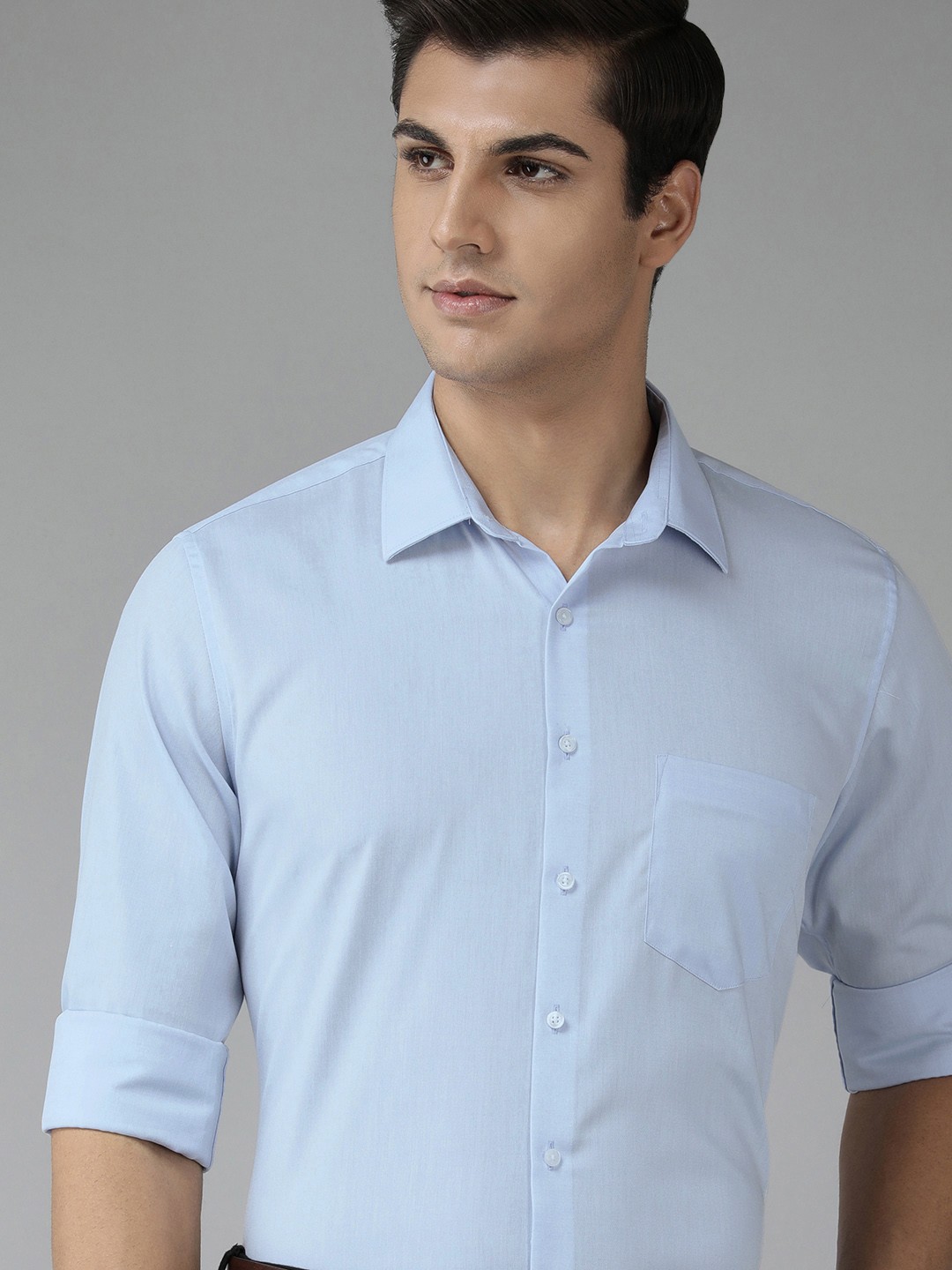 

Van Heusen Men Blue Slim Fit Solid Pure Cotton Formal Shirt