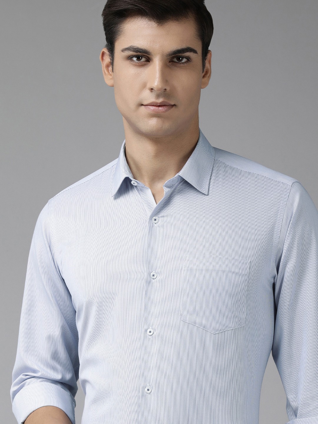 

Van Heusen Men Blue Striped Pure Cotton Formal Shirt