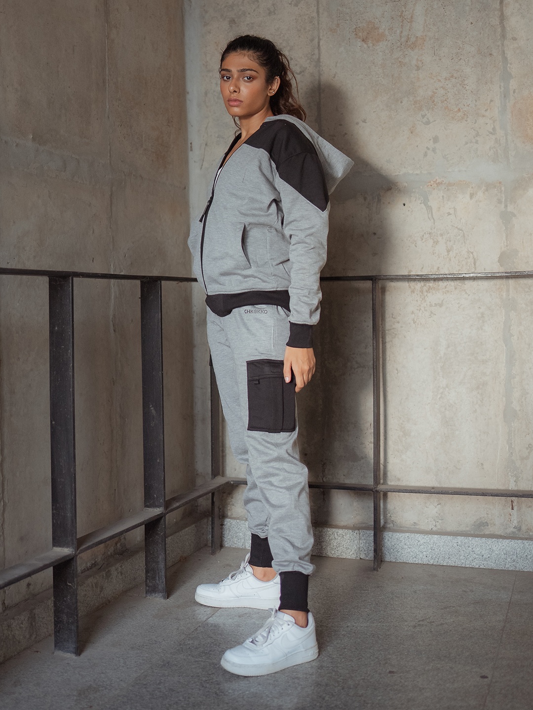 

CHKOKKO Women Black and Grey Colourblocked Hooded Tracksuit
