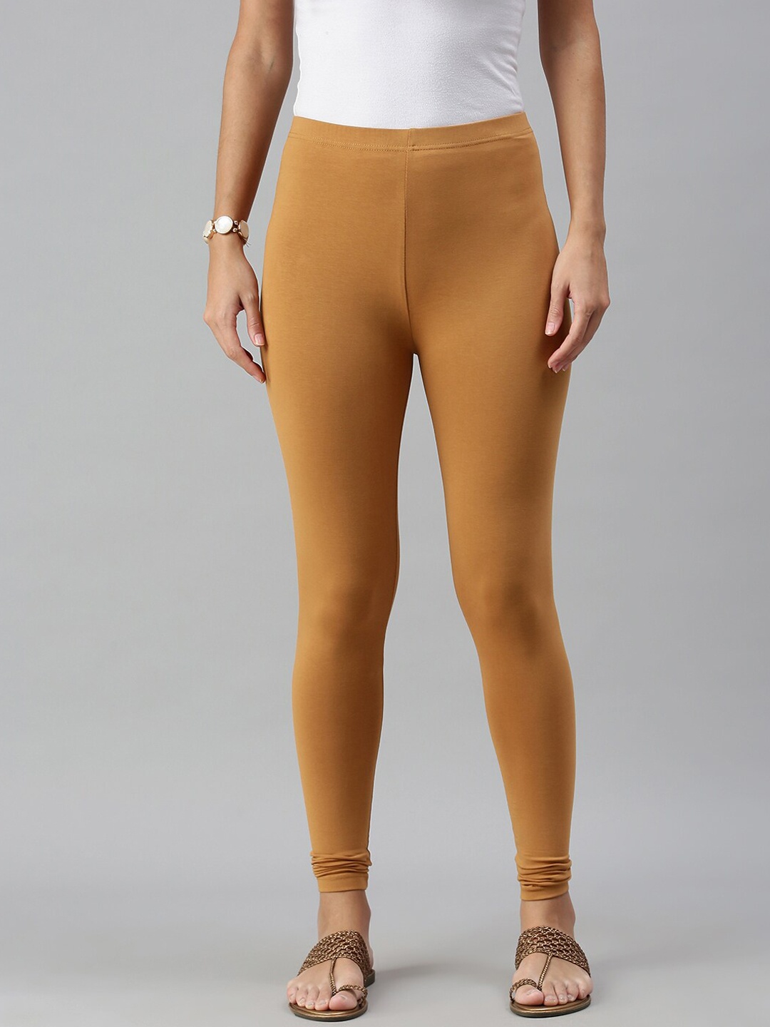 

De Moza Women Mustard Solid Churidar Length Cotton Leggings