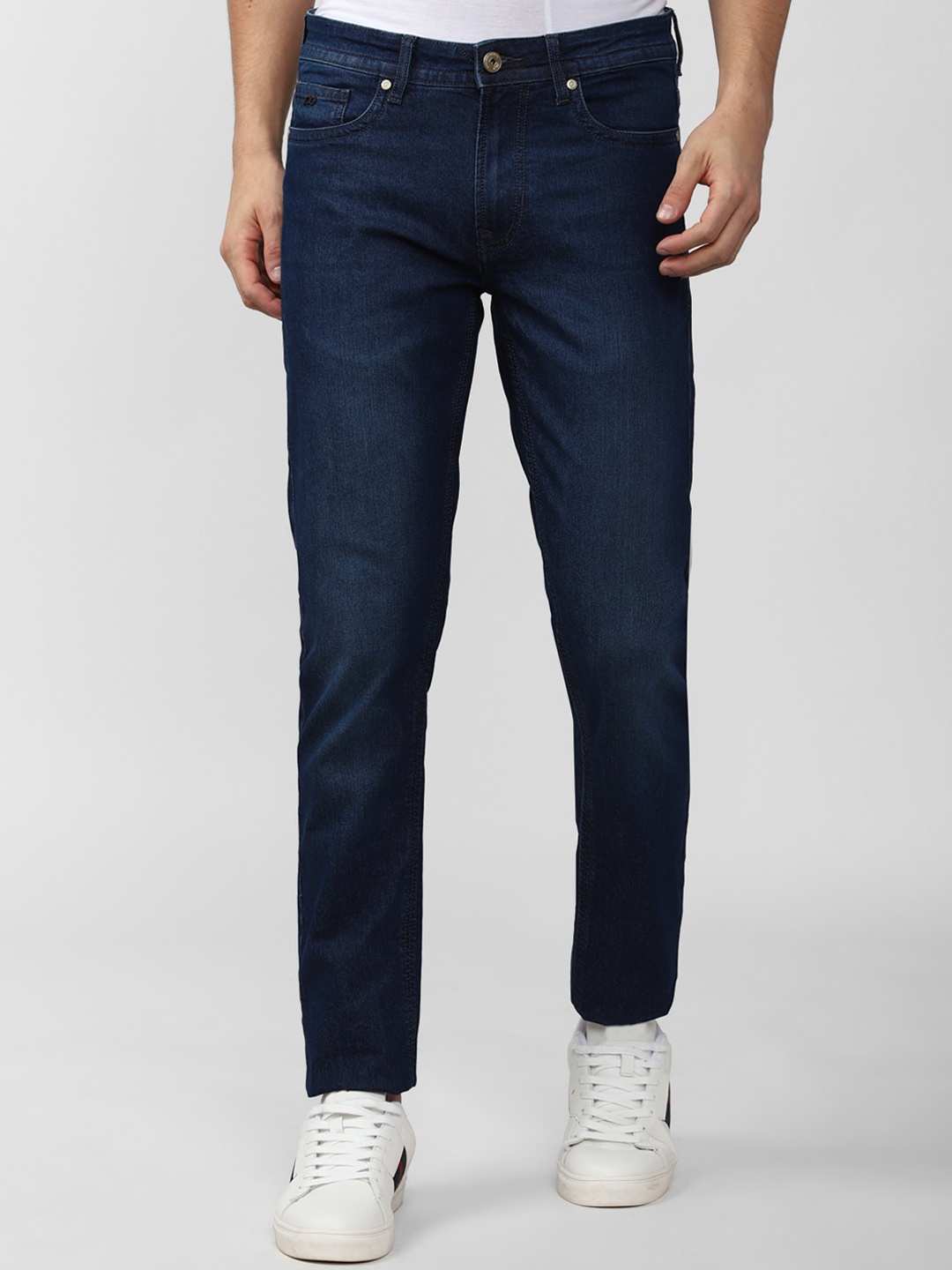 

Peter England Casuals Men Navy Blue Light Fade Jeans