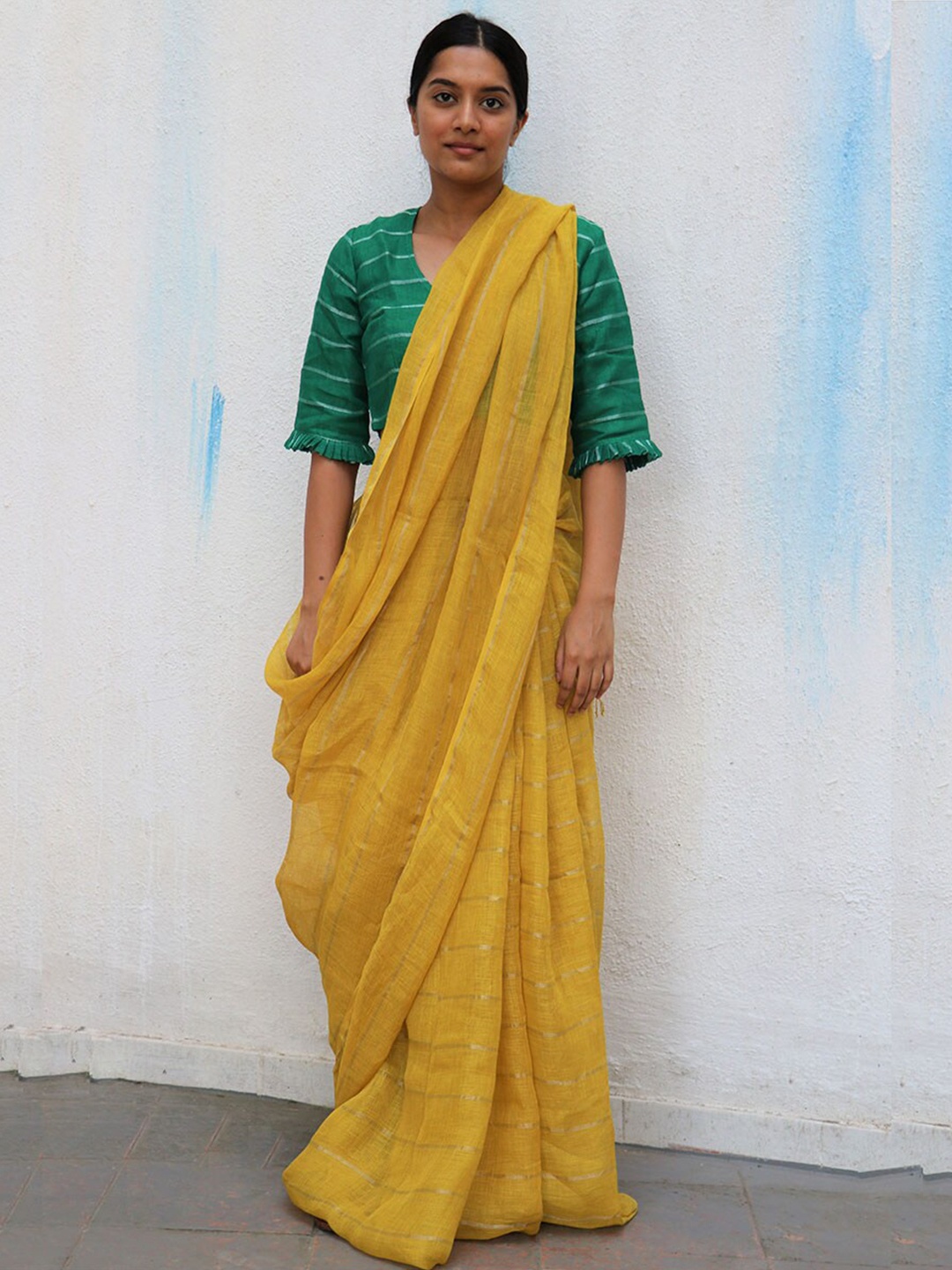 

Chidiyaa Yellow & Gold-Toned Striped Zari Pure Linen Saree