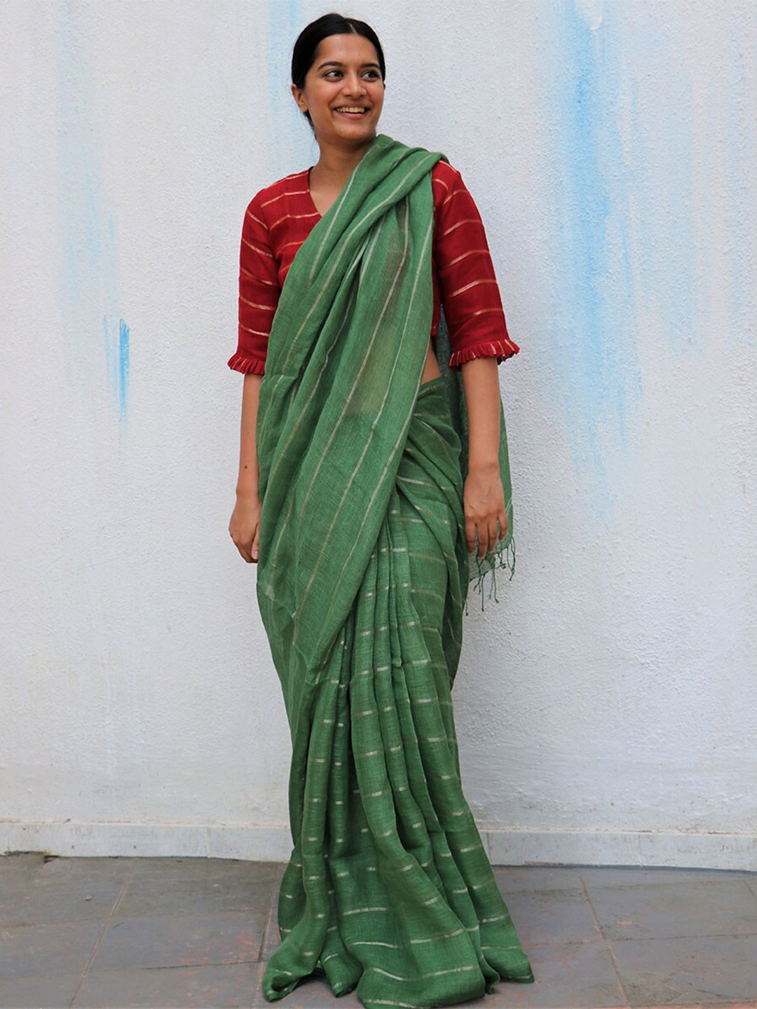 

Chidiyaa Green & Silver-Toned Striped Zari Pure Linen Saree