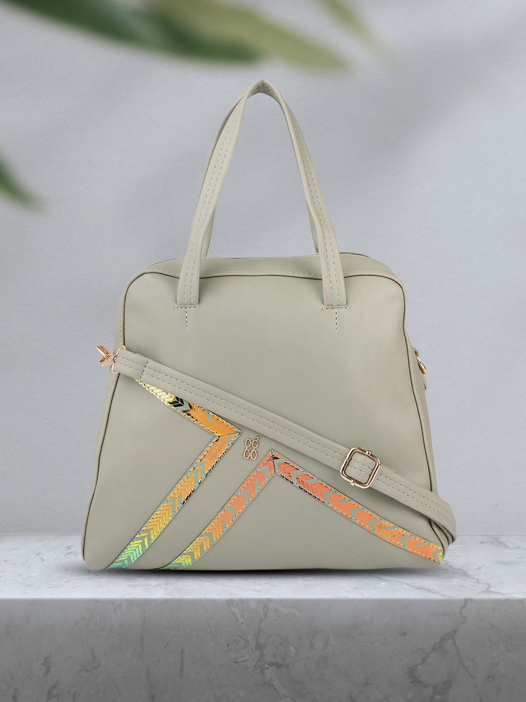 

Baggit Mint Green Solid Handheld Bag