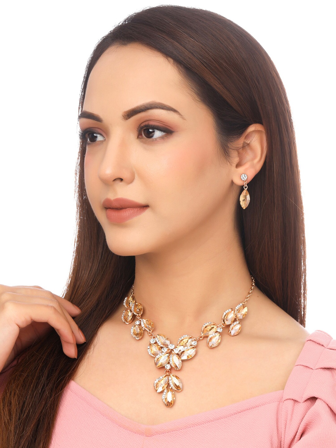 

Yellow Chimes Gold Toned Oval Shaped Crystal Studded Necklace Set