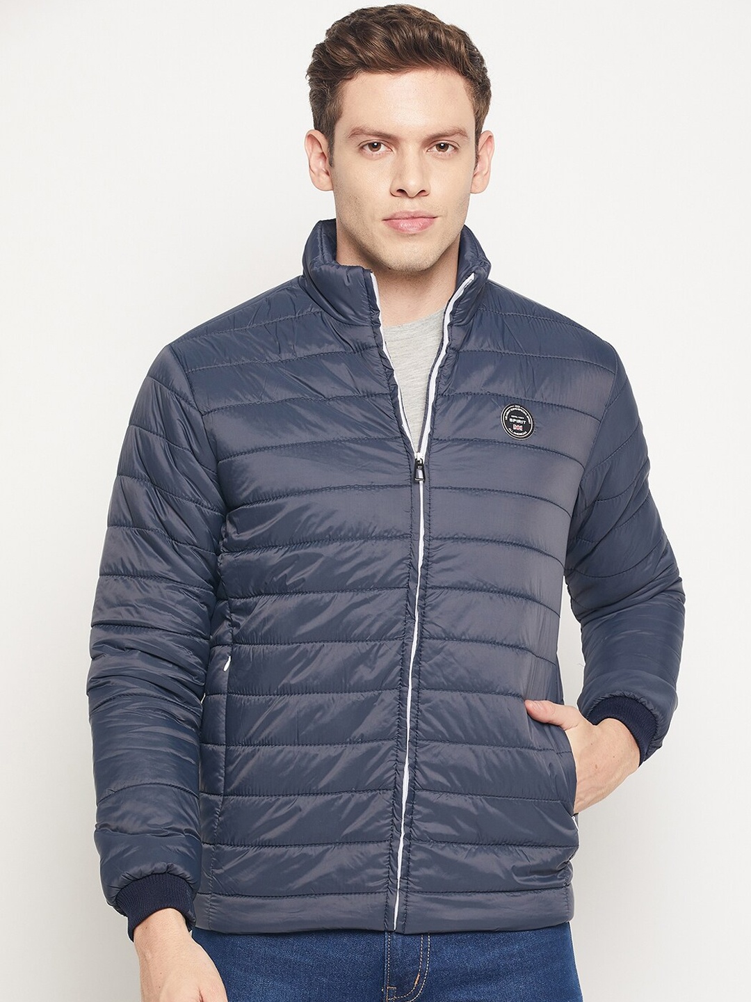 

Spirit Men Navy Blue Windcheater and Water Resistant Padded Jacket