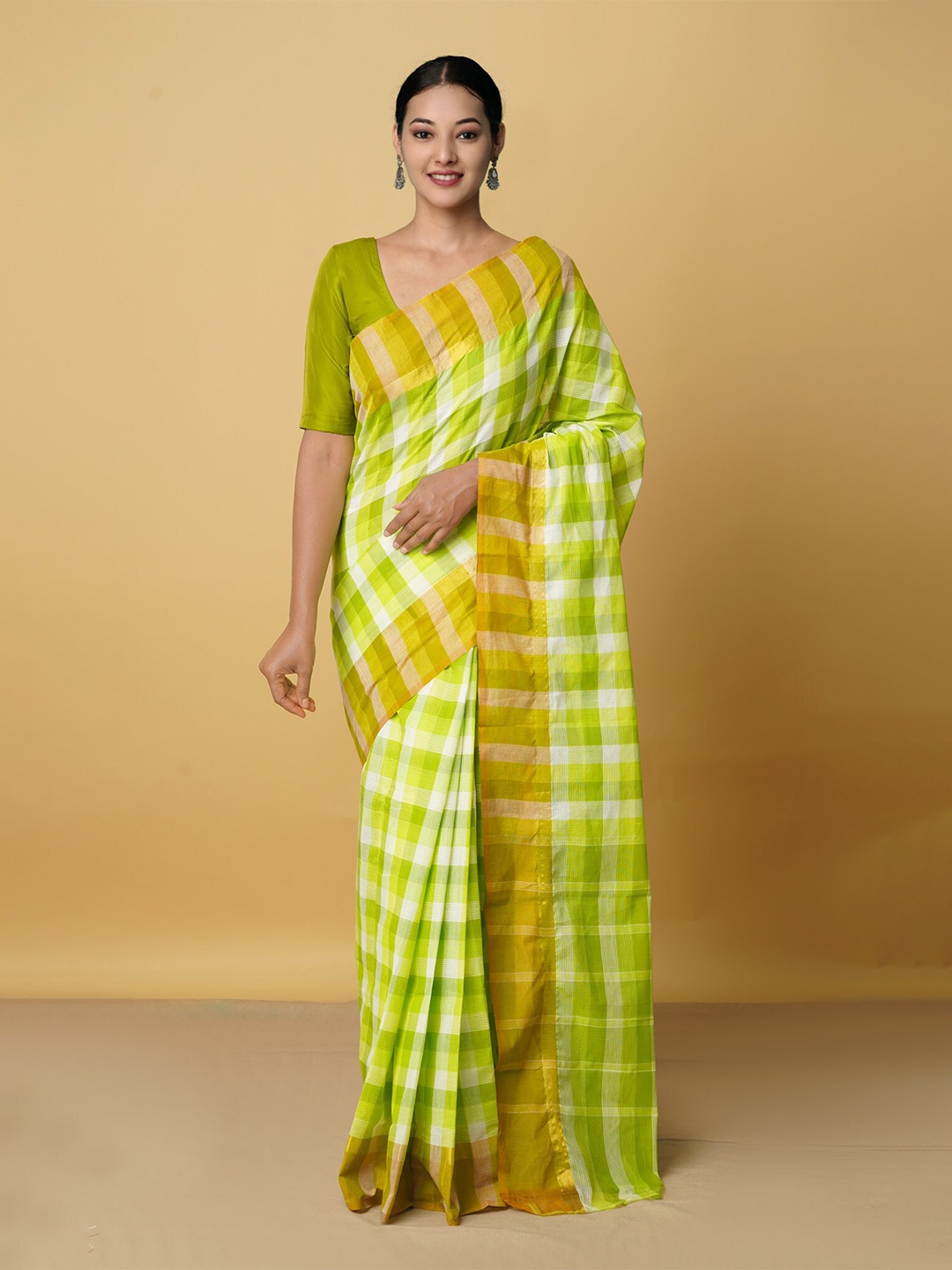 

Unnati Silks Green & White Checked Pure Cotton Mangalagiri Saree