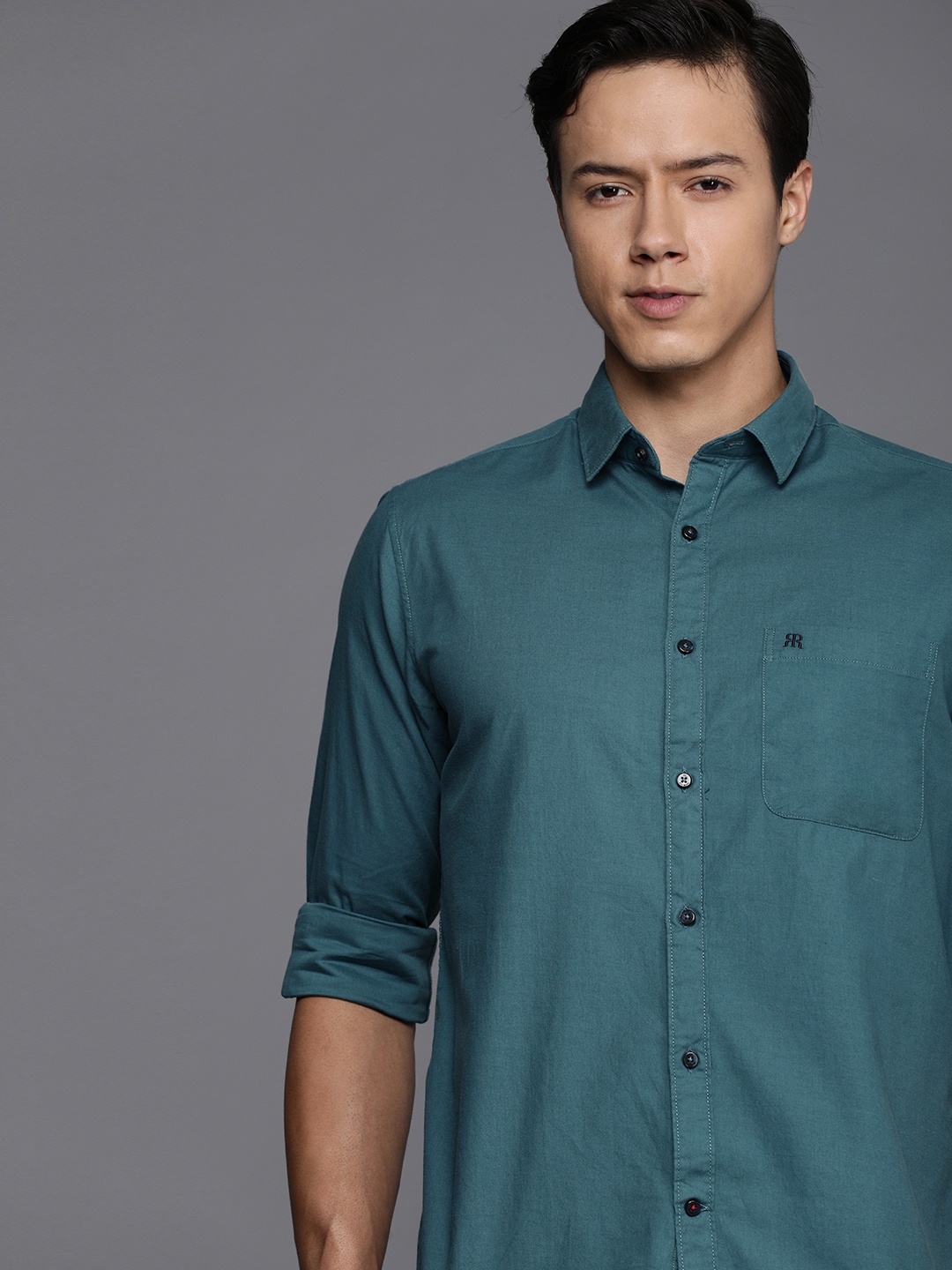 

Raymond Men Blue Pure Cotton Solid Slim Fit Casual Shirt