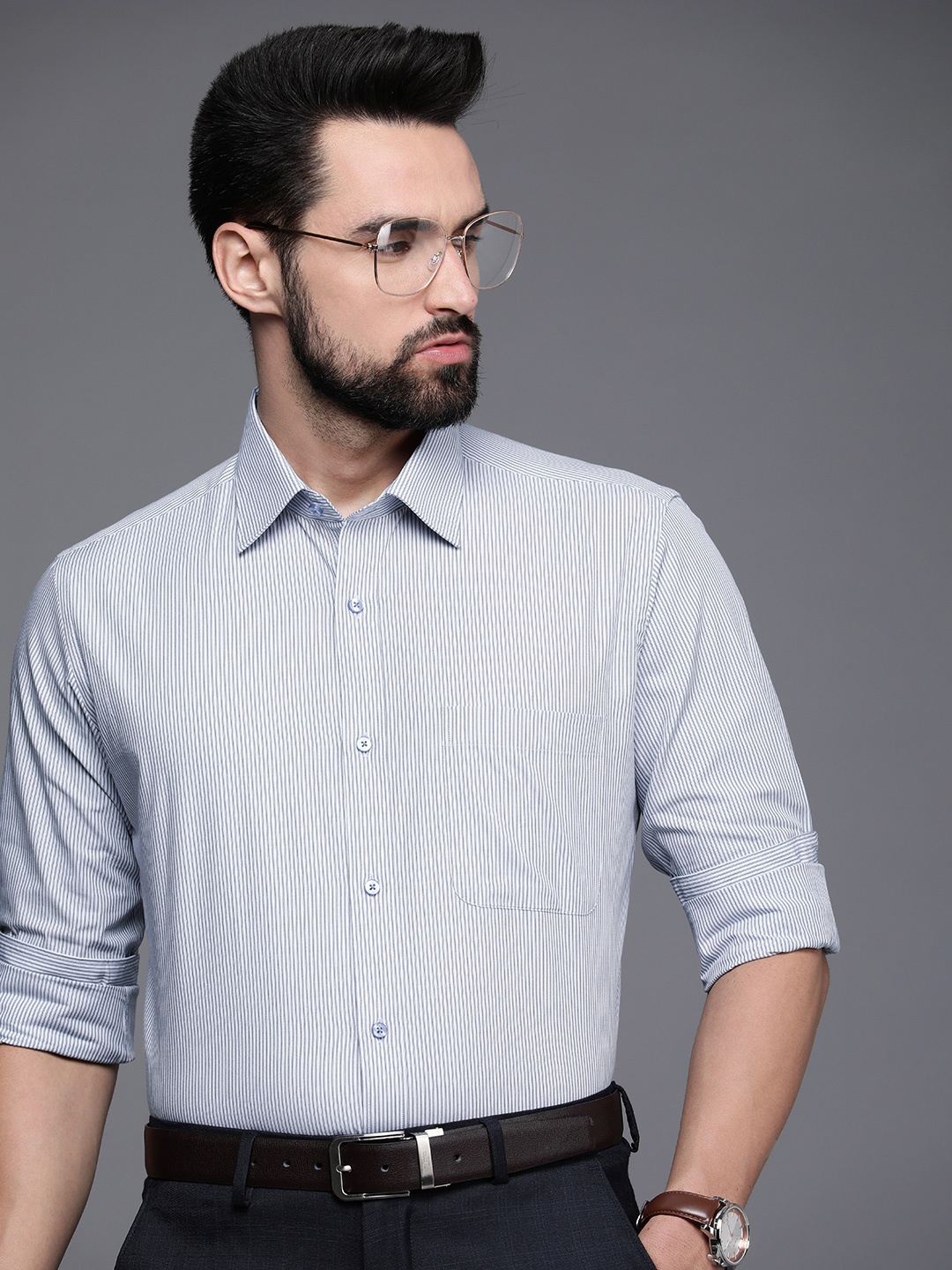 

Raymond Men Blue And White Slim Fit Pinstriped Pure Cotton Formal Shirt