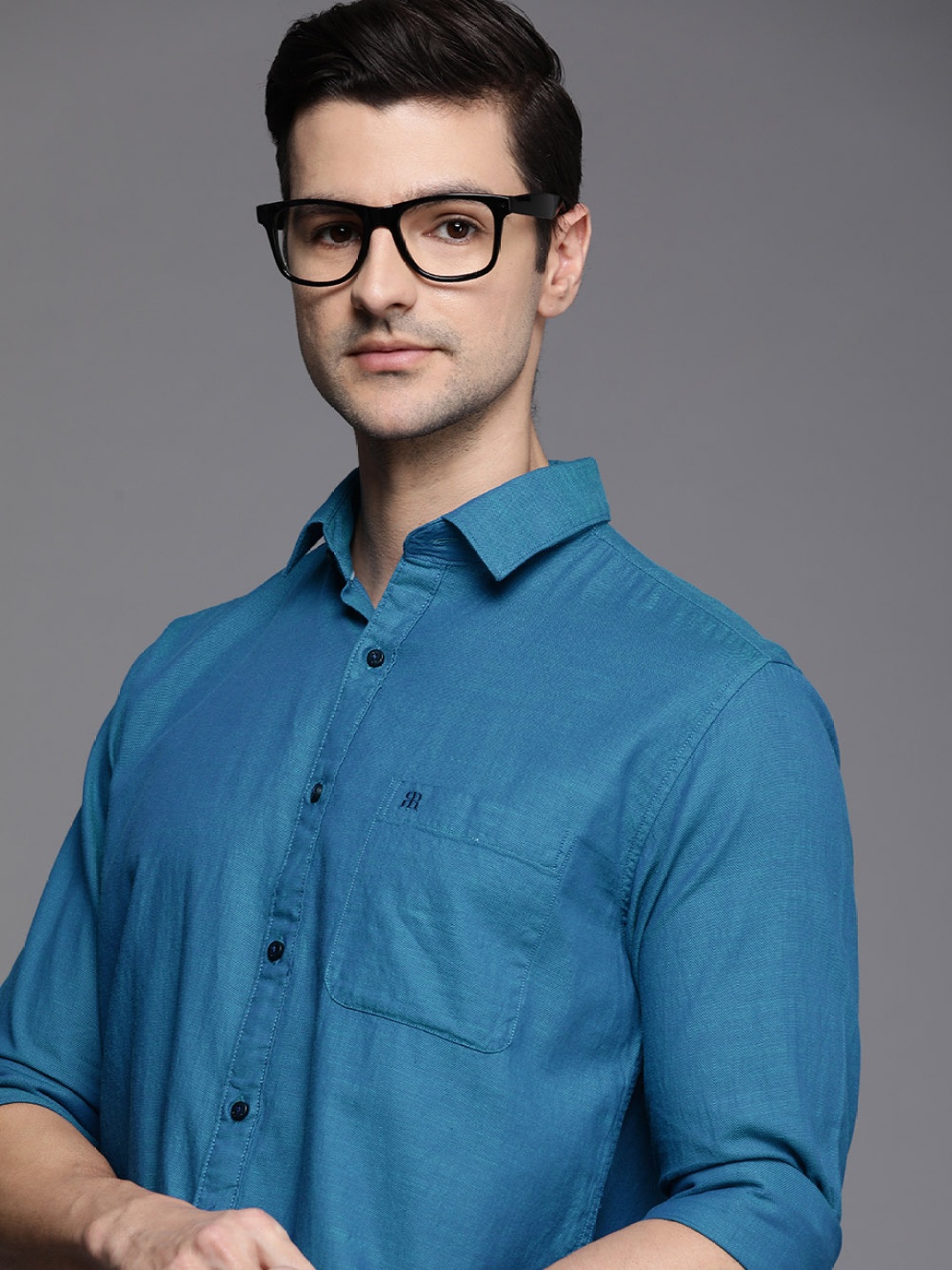 

Raymond Men Blue Solid Pure Cotton Slim Fit Casual Shirt