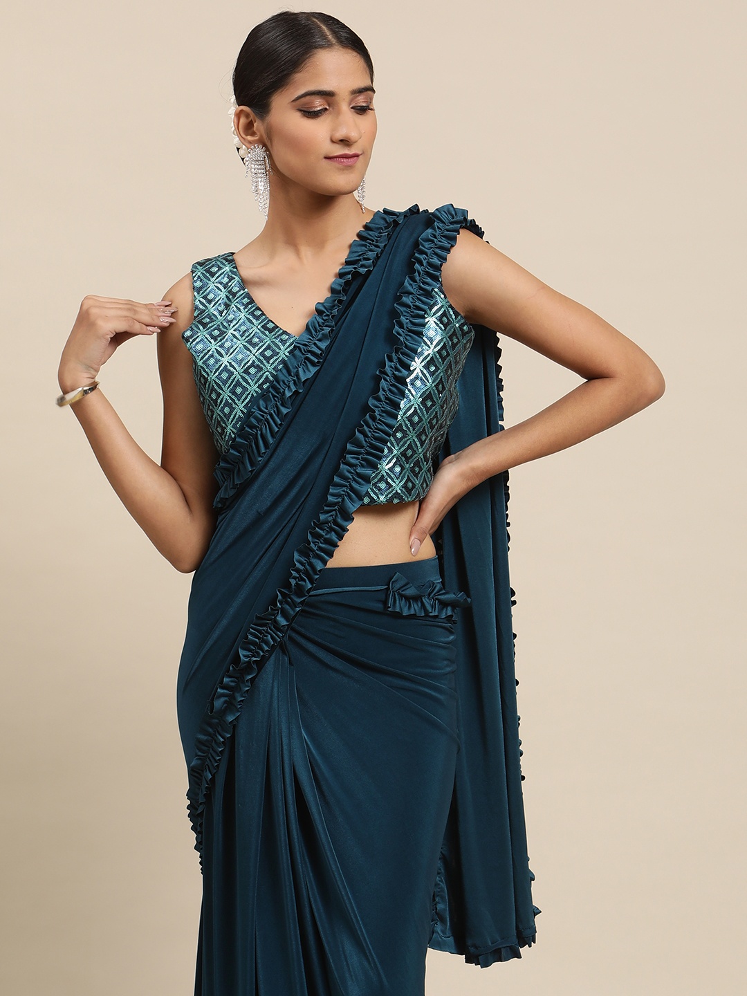 

Mitera Teal Blue Sequinned Ready to Wear Leheriya Saree