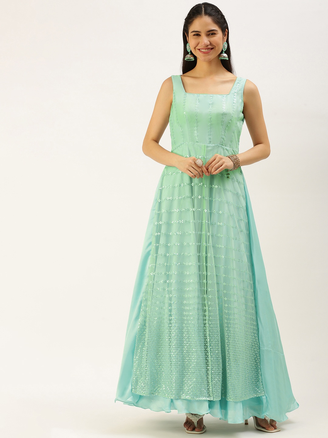 

Ethnovog Turquoise Blue Embellished Net Ethnic Gown