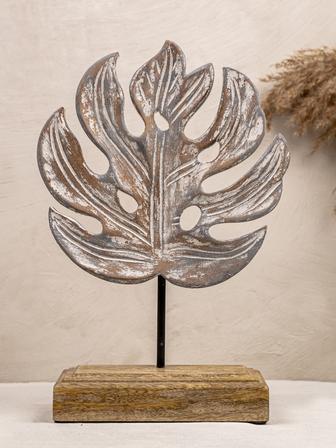

The 7 DeKor Grey Solid Leaf Sculpture Showpiece