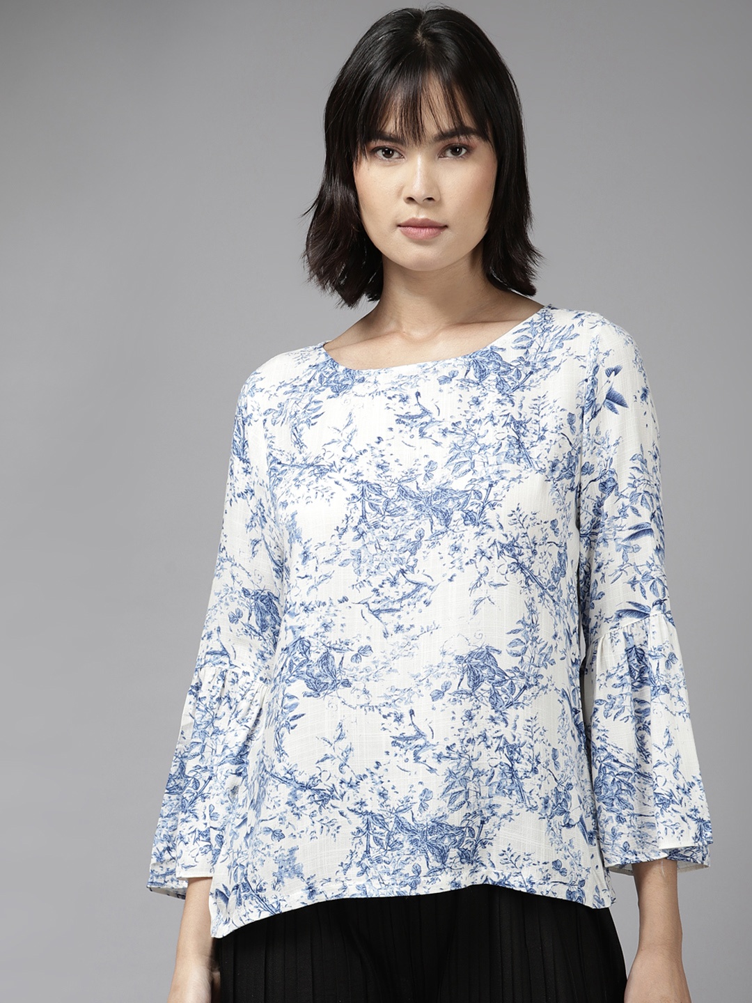 

Aarika White & Blue Floral Print Georgette Top