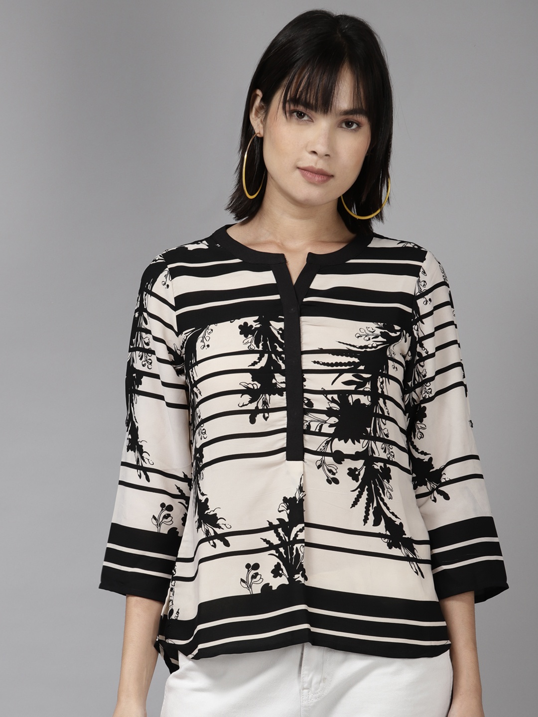 

Aarika Black & Off White Floral Print Georgette Top
