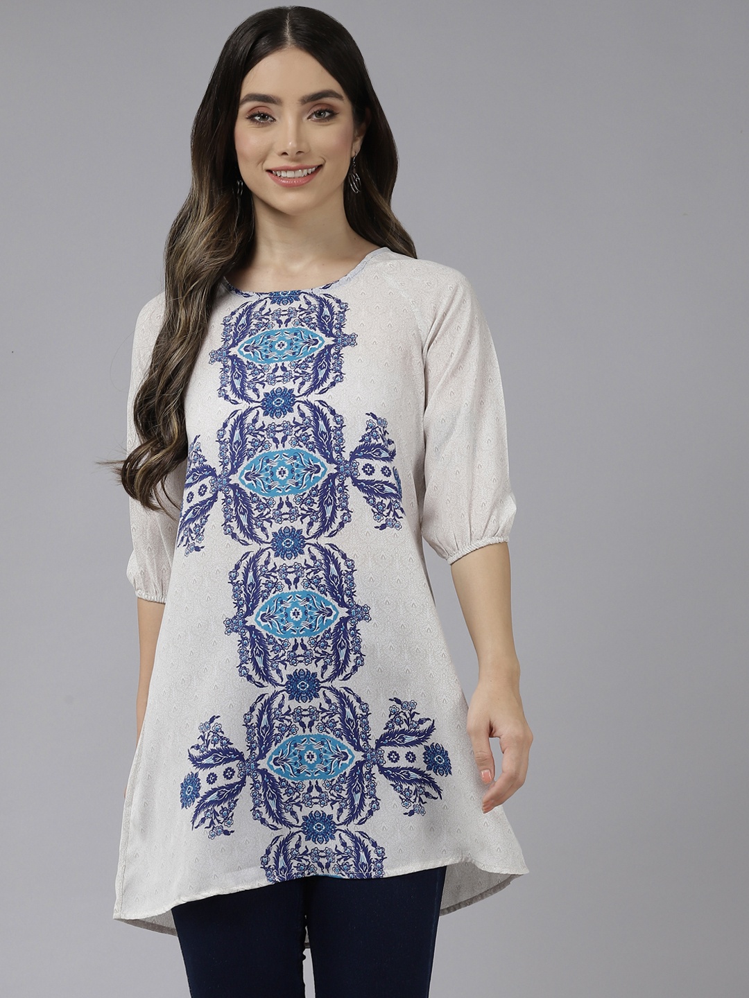 

Aarika White & Blue Floral Print Georgette Longline Top