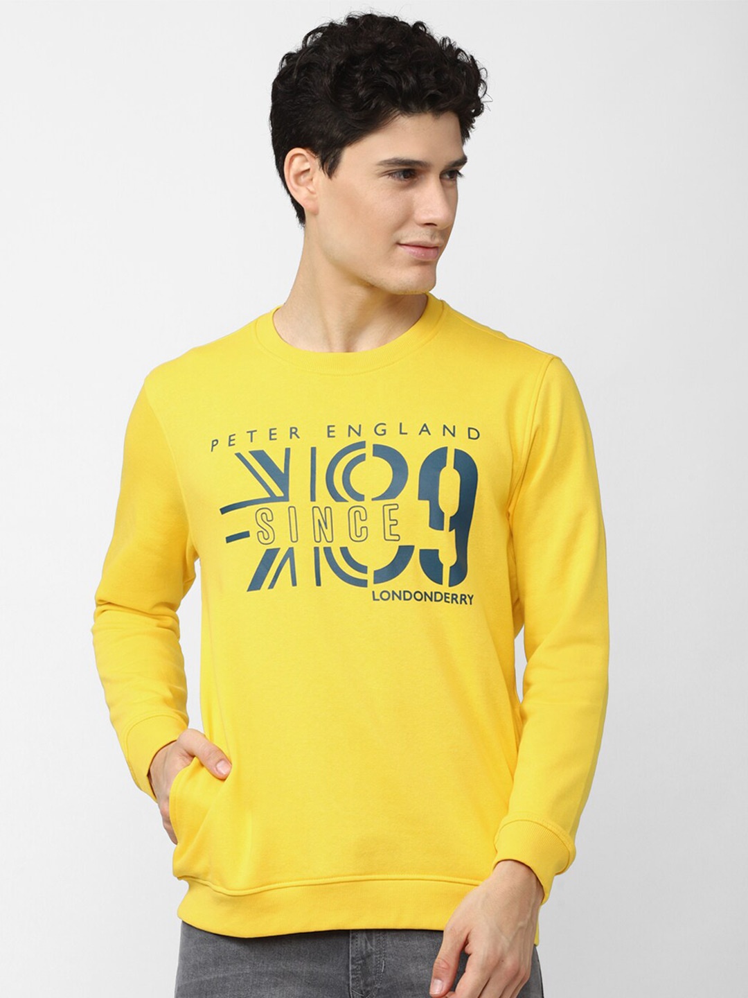 

Peter England Casuals Men Yellow Printed Sweatshirt