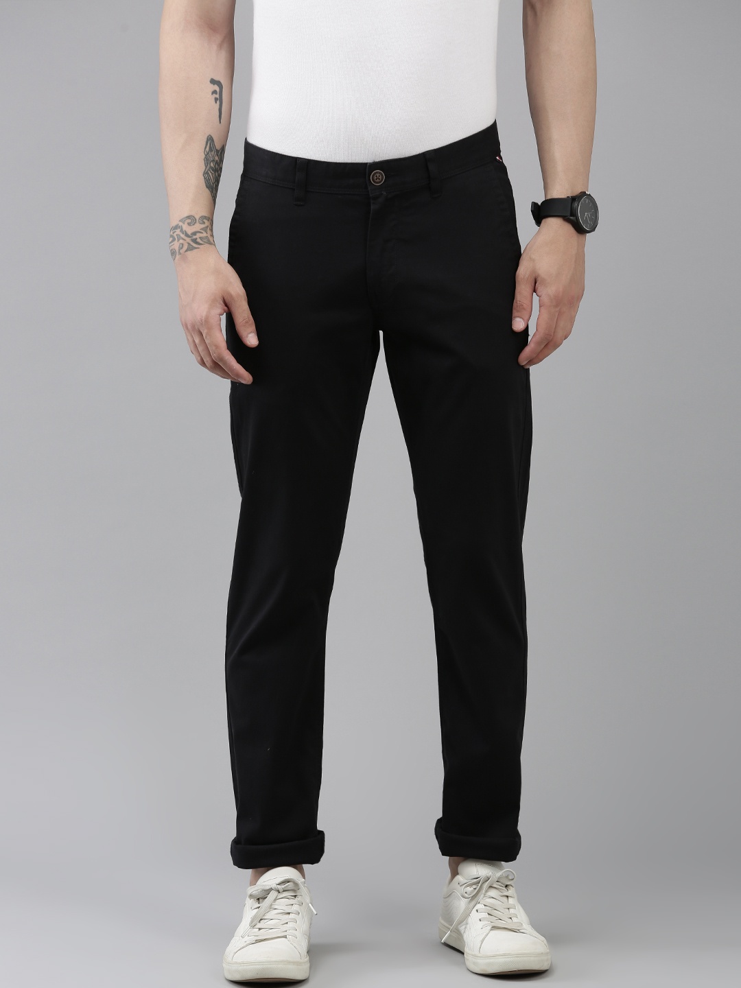 

Van Heusen Sport Men Solid Slim Fit Mid-Rise Trousers, Black