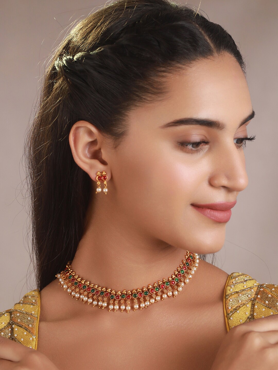 

Priyaasi Gold-Toned & Plated Red & Green Stone Studded Jewellery Set