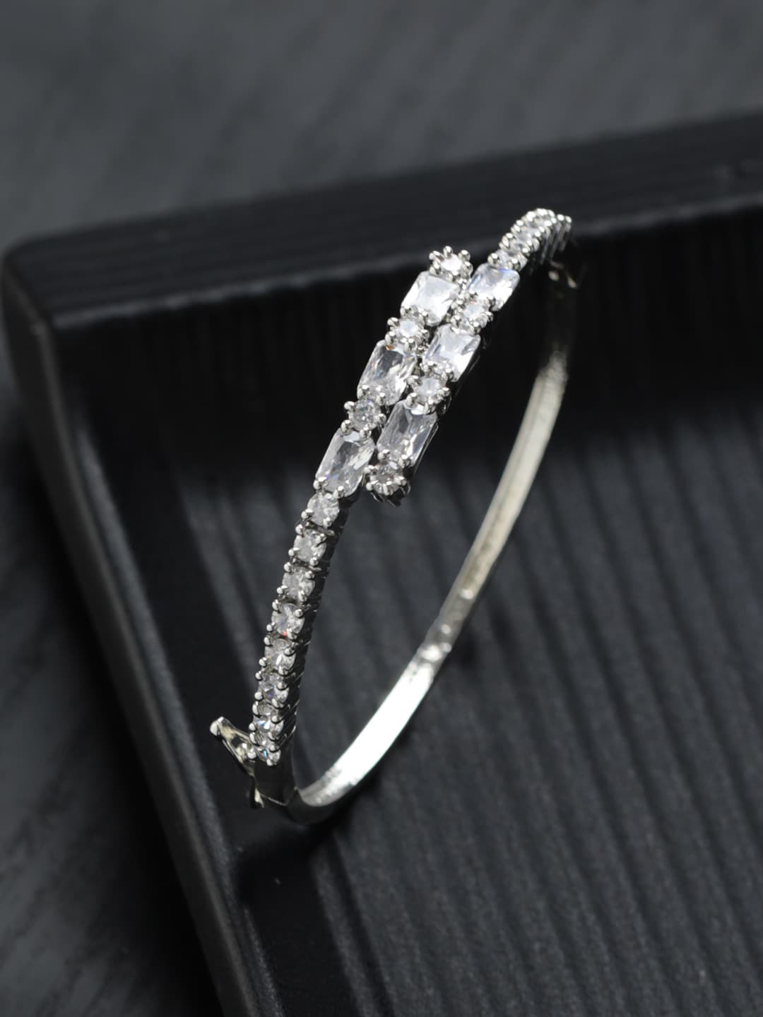 

Priyaasi Women Brass American Diamond Handcrafted Silver-Plated Bangle-Style Bracelet