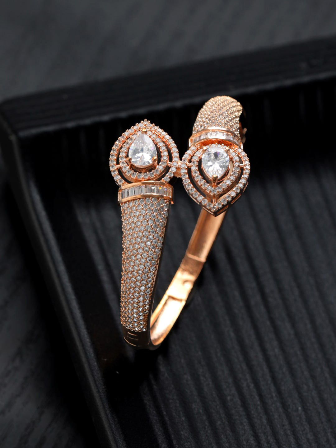 

Priyaasi Women Brass American Diamond Rose Gold-Plated Bangle-Style Bracelet