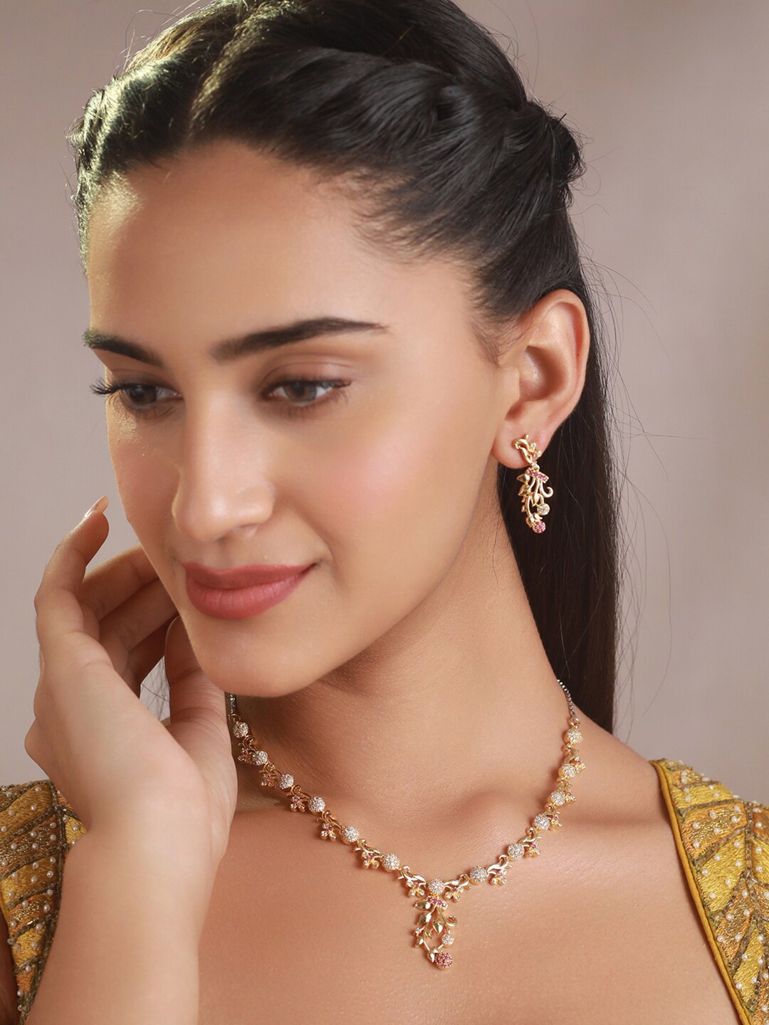 

Priyaasi Gold-Plated White & Pink AD studded Floral Leaf Jewellery Set