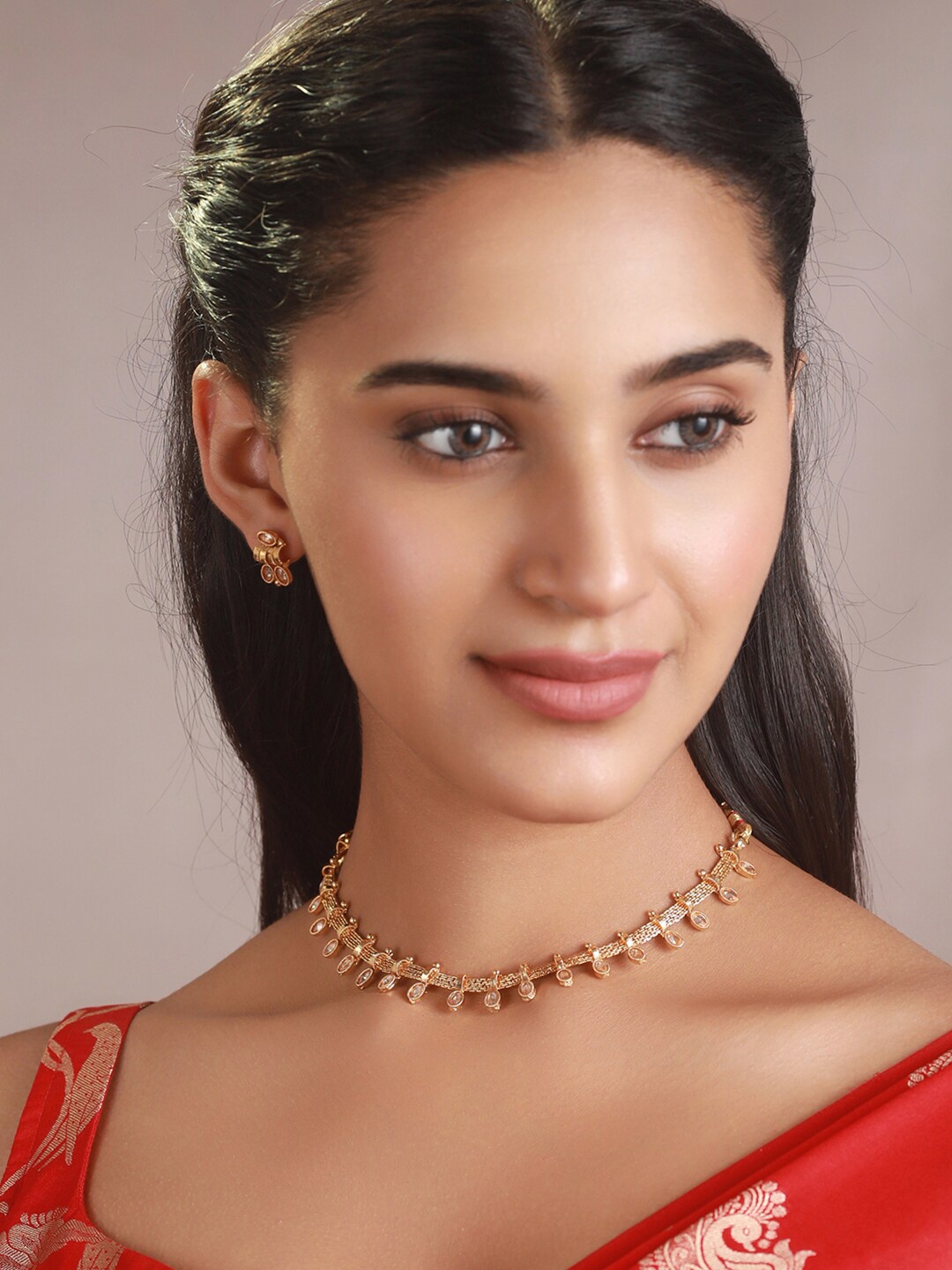 

Priyaasi Gold-Plated White Stone-Studded Jewellery Set
