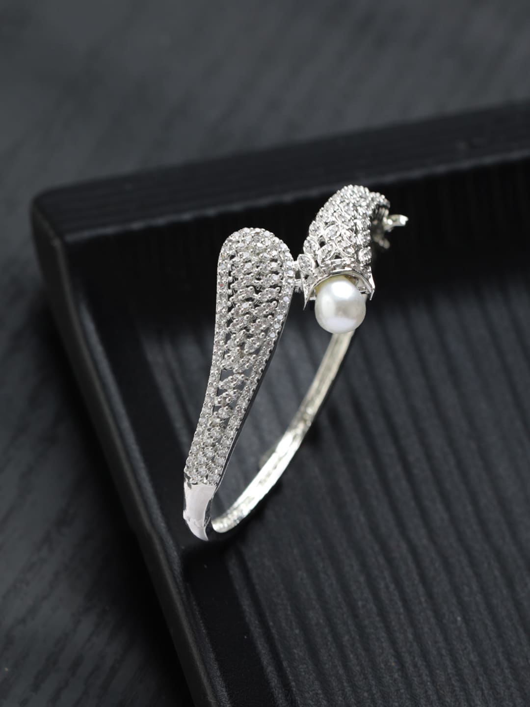 

Priyaasi Women American Diamond Silver-Plated Bangle-Style Bracelet