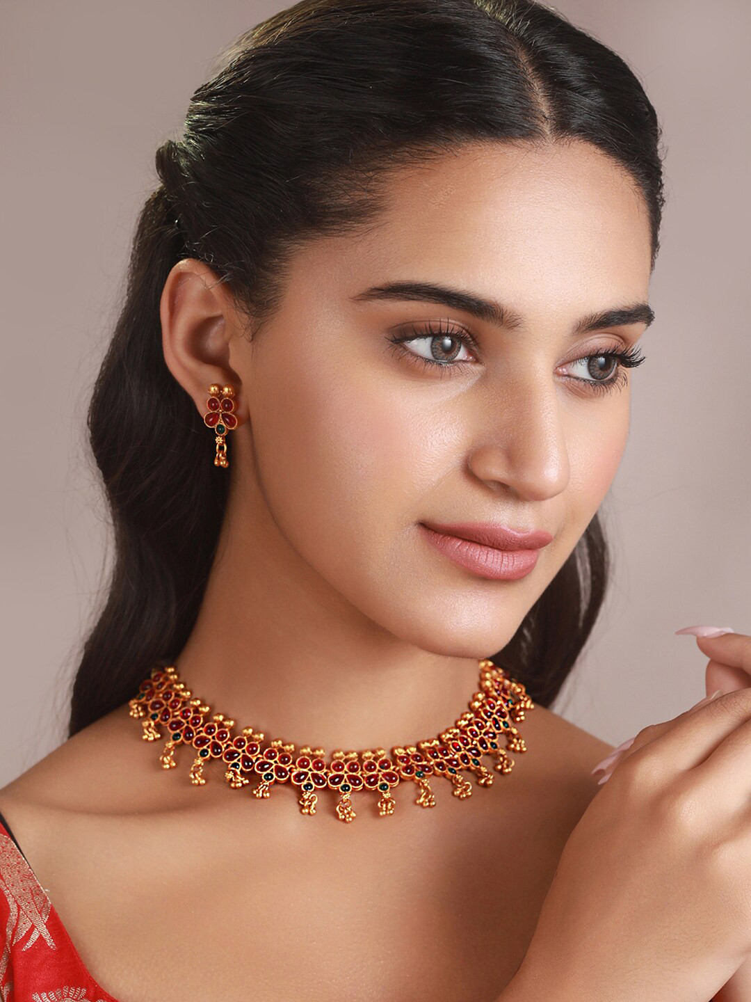 

Priyaasi Gold Plated Pink Artificial Stone Studded Jewellery Set