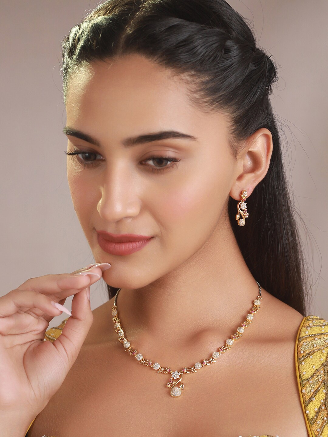

Priyaasi Gold-Plated & White AD Studded Jewellery Set