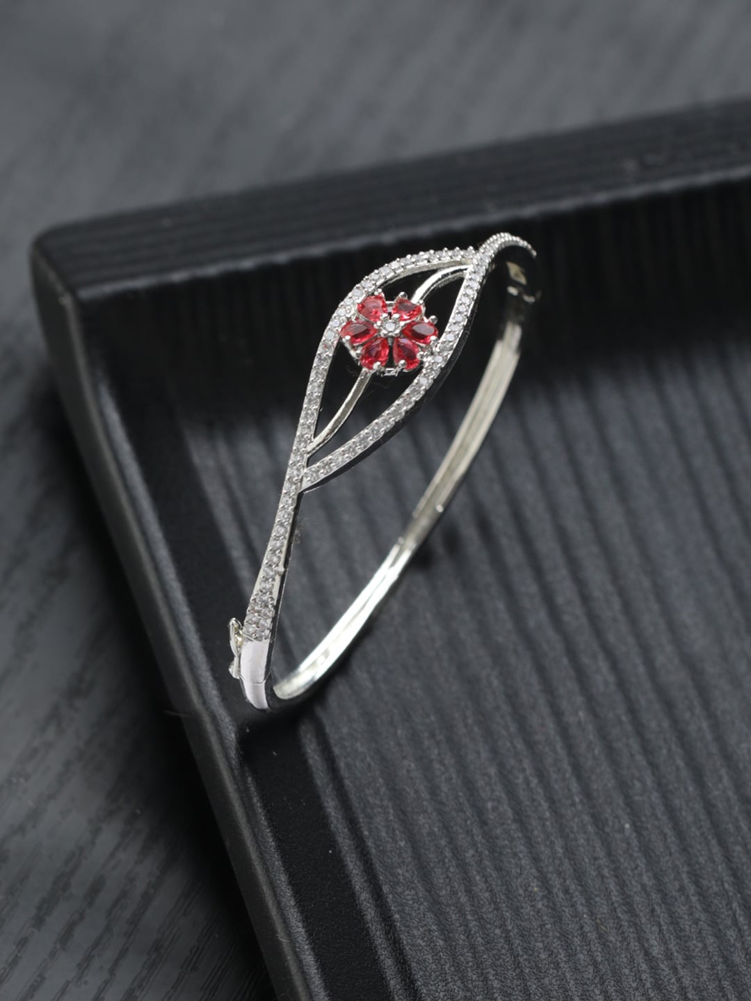 

Priyaasi Women American Diamond Silver-Plated Bangle-Style Bracelet