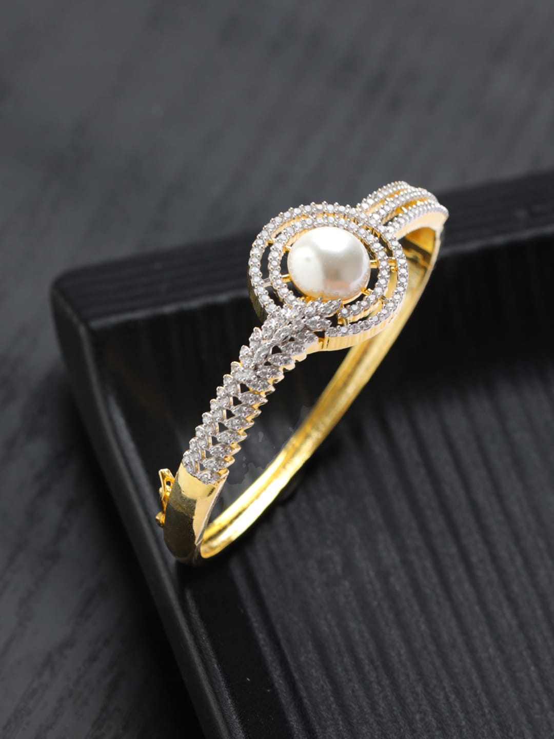 

Priyaasi Women Brass American Diamond Gold-Plated Bangle-Style Bracelet