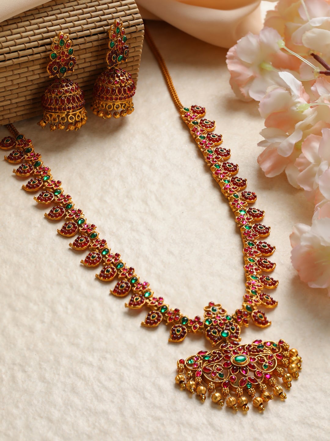 

Priyaasi Gold Toned And Pink Floral Paisley Kemp Stone Studded Jewellery Set