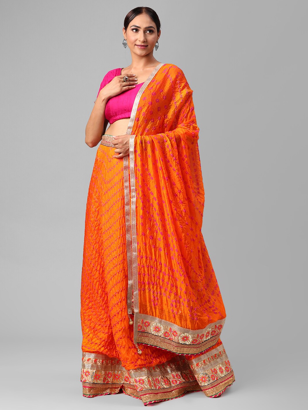 

Kastiel Orange & Pink Embellished Semi-Stitched Lehenga & Unstitched Blouse With Dupatta