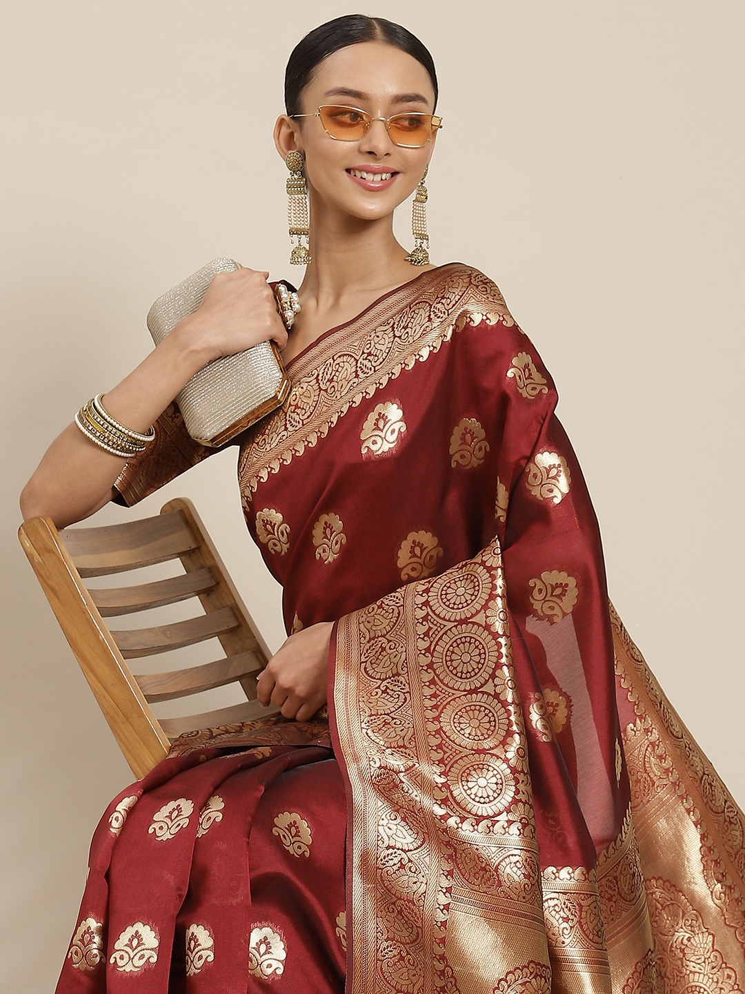 

Varanga Maroon & Golden Ethnic Motifs Zari Silk Blend Banarasi Saree